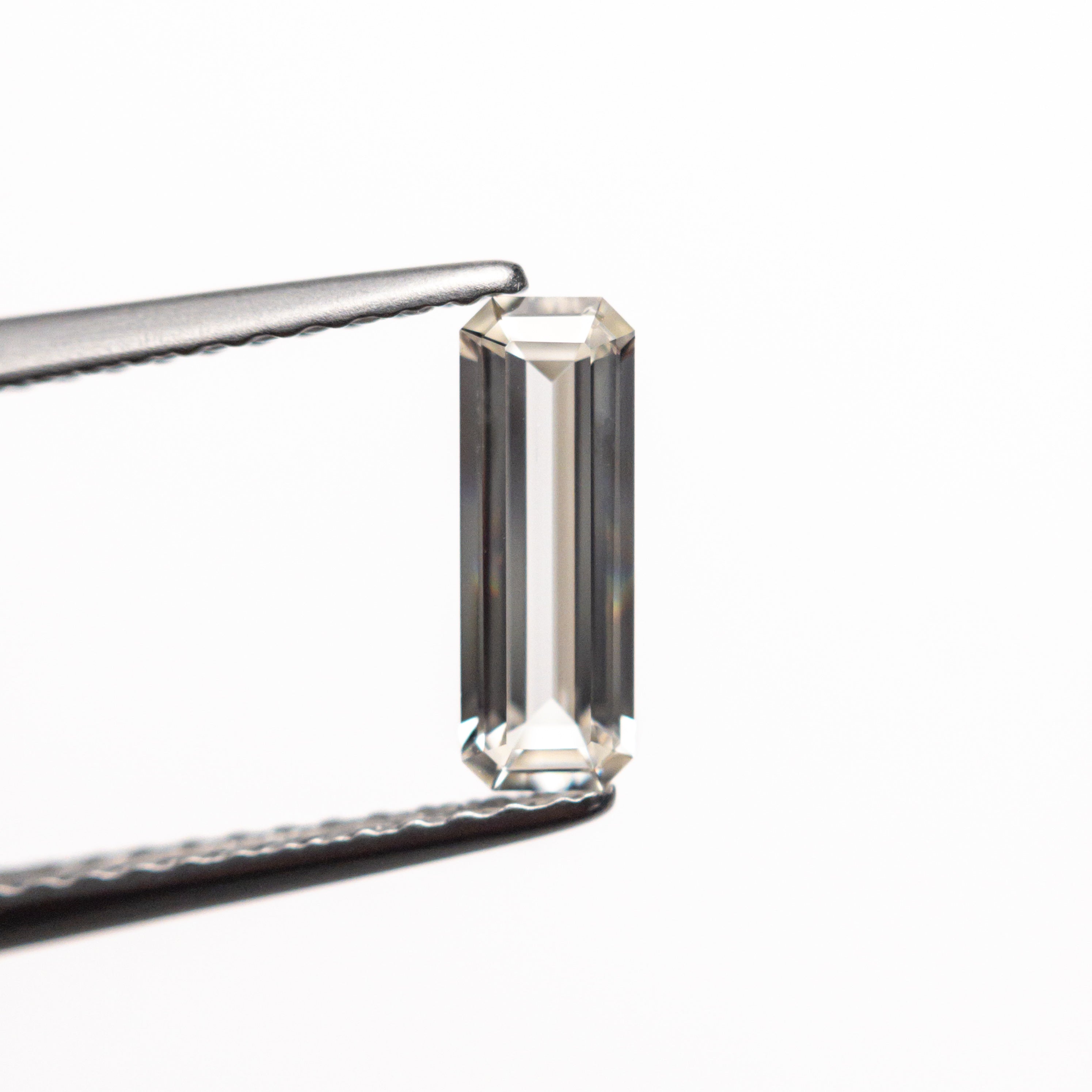 0.52ct 8.48x3.00x1.83mm Cut Corner Rectangle Step Cut Sapphire 23098-01-Staghead Designs