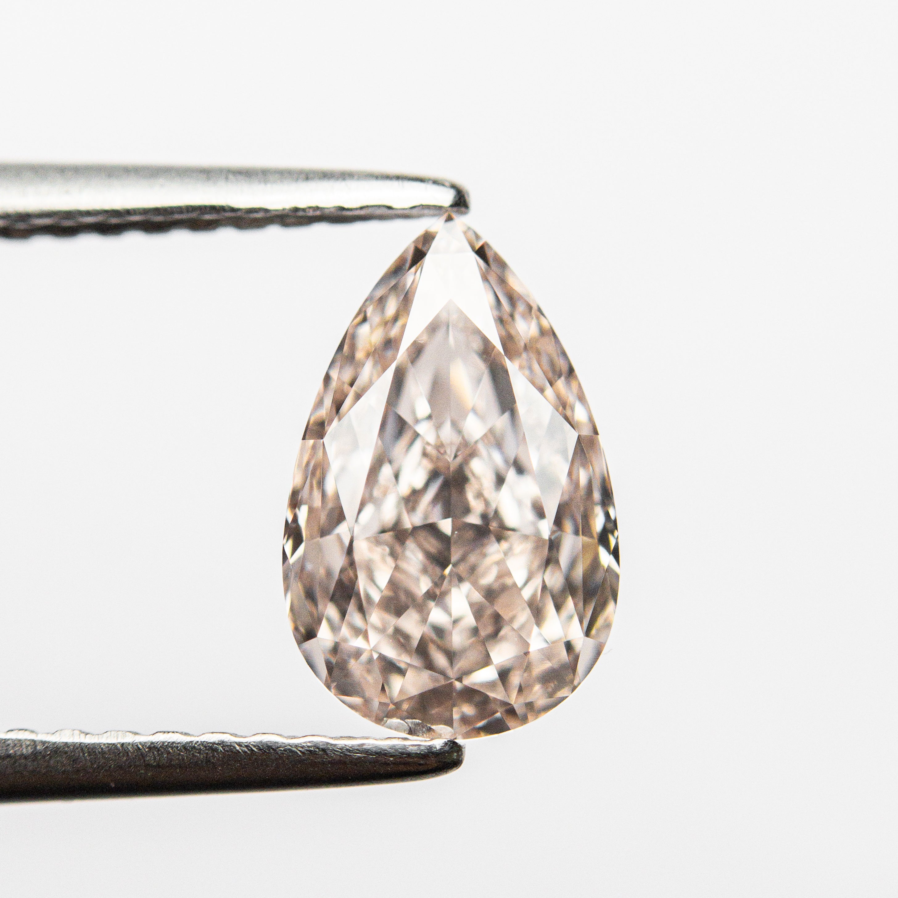 1.61ct 9.36x5.89x3.89mm GIA Internally Flawless Fancy Light Brownish Pink Pear Brilliant 24160-01-Staghead Designs