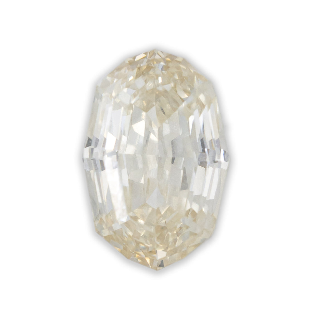 An oval cut champagne diamond on a white background