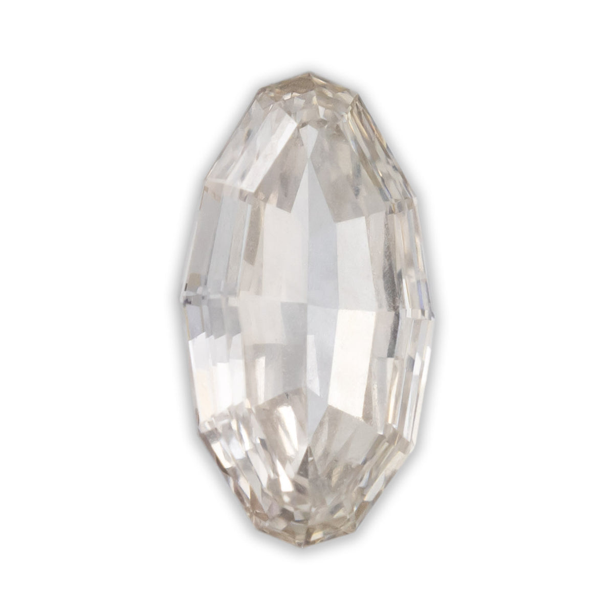 A marquise cut champagne diamond on a white background