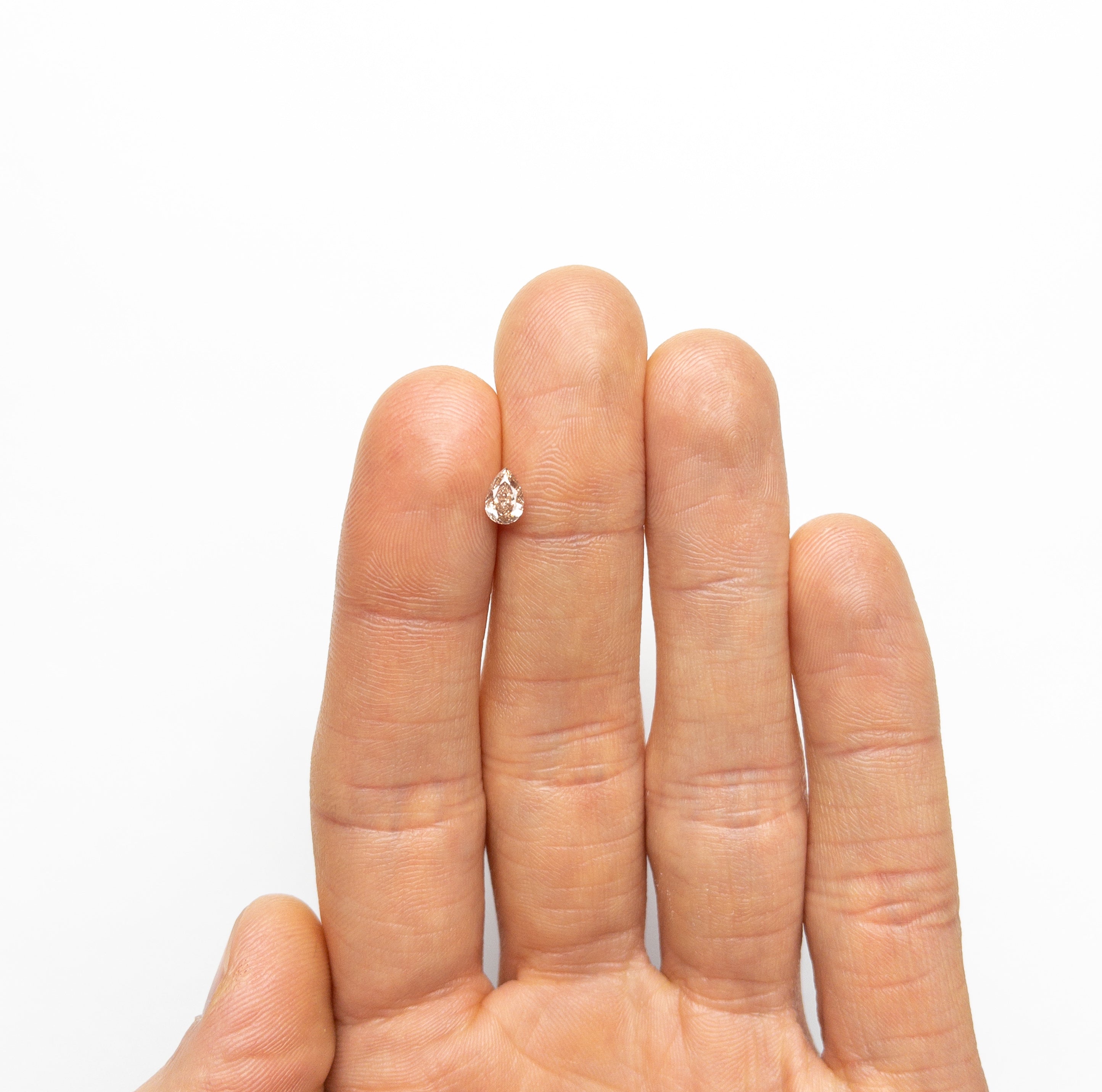 0.45ct 6.05x4.10x2.54mm SI2 Fancy Brownish Pink Pear Brilliant 19920-01-Staghead Designs