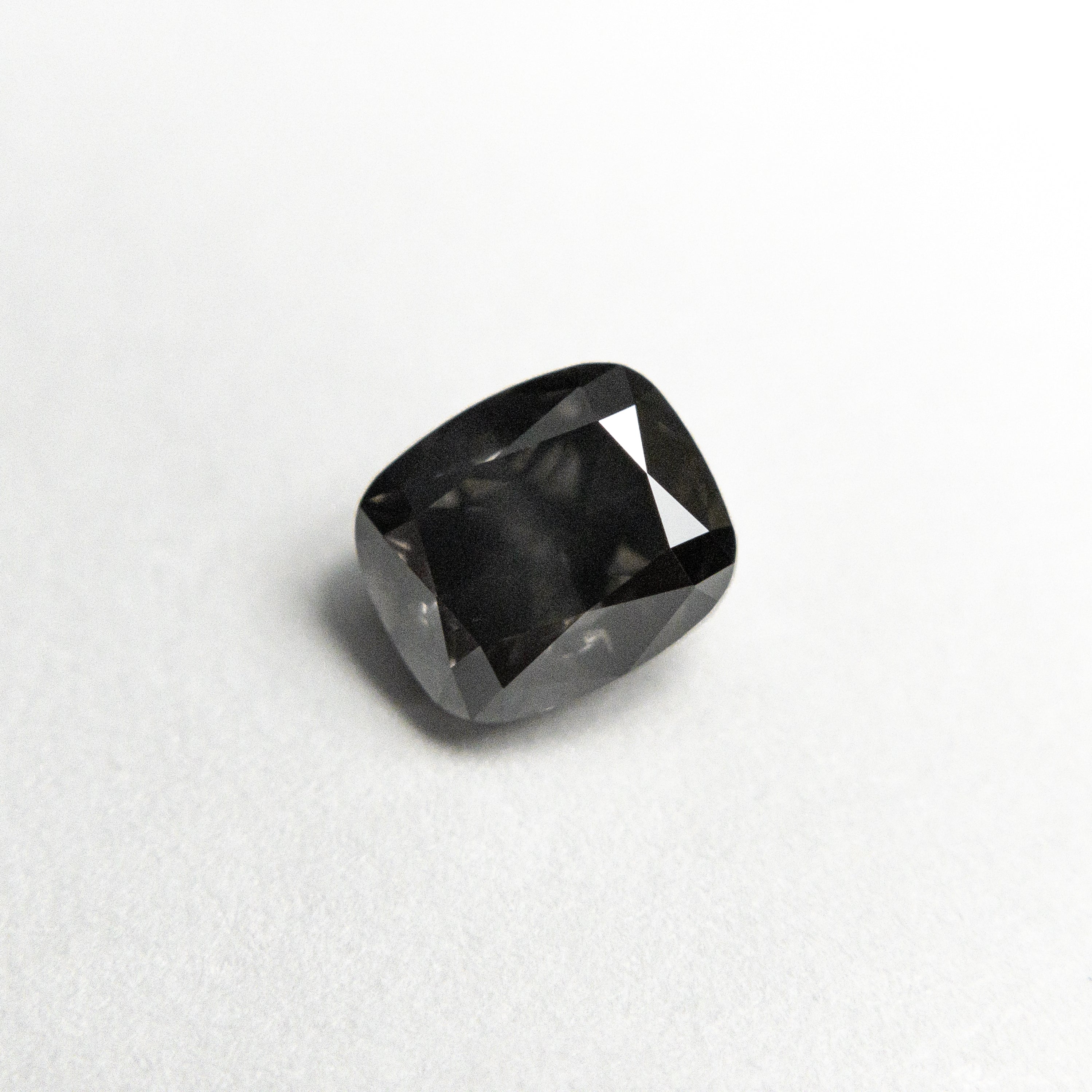 0.73ct 5.28x4.54x3.21mm SI2 Fancy Dark Grey Cushion Brilliant 19923-10-Staghead Designs