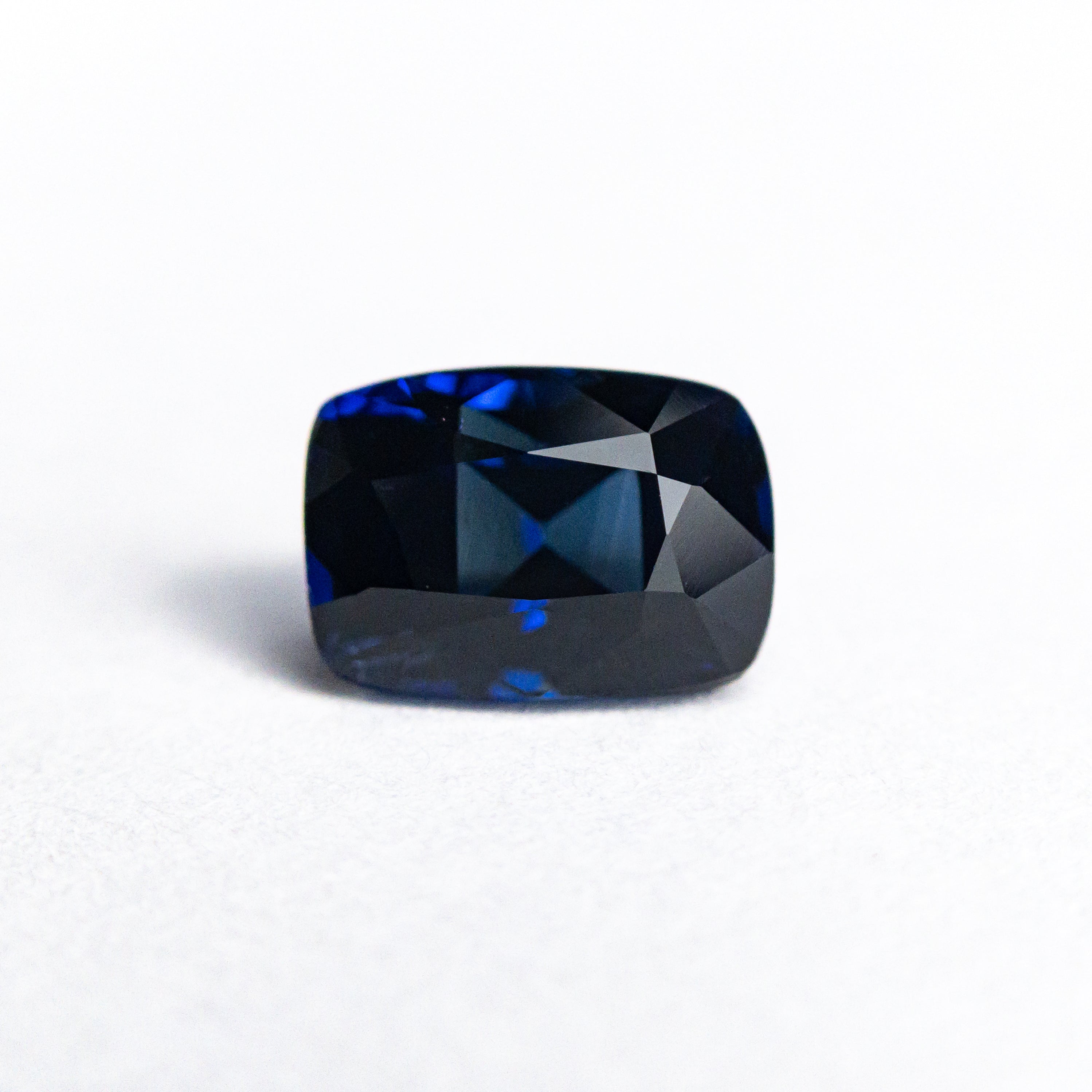 1.51ct 7.06x5.04x4.55mm Cushion Brilliant Sapphire 22028-01-Staghead Designs