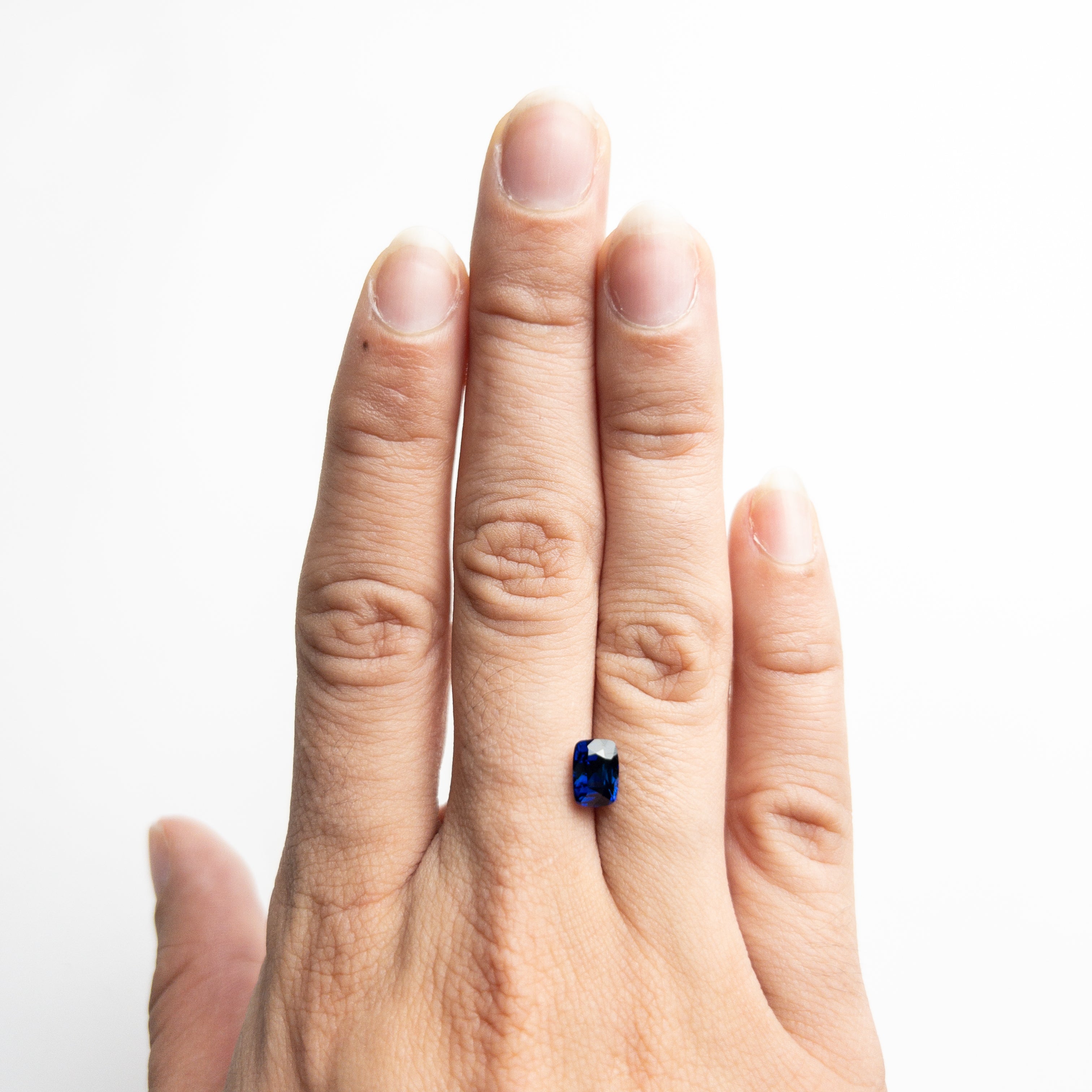 1.51ct 7.06x5.04x4.55mm Cushion Brilliant Sapphire 22028-01-Staghead Designs