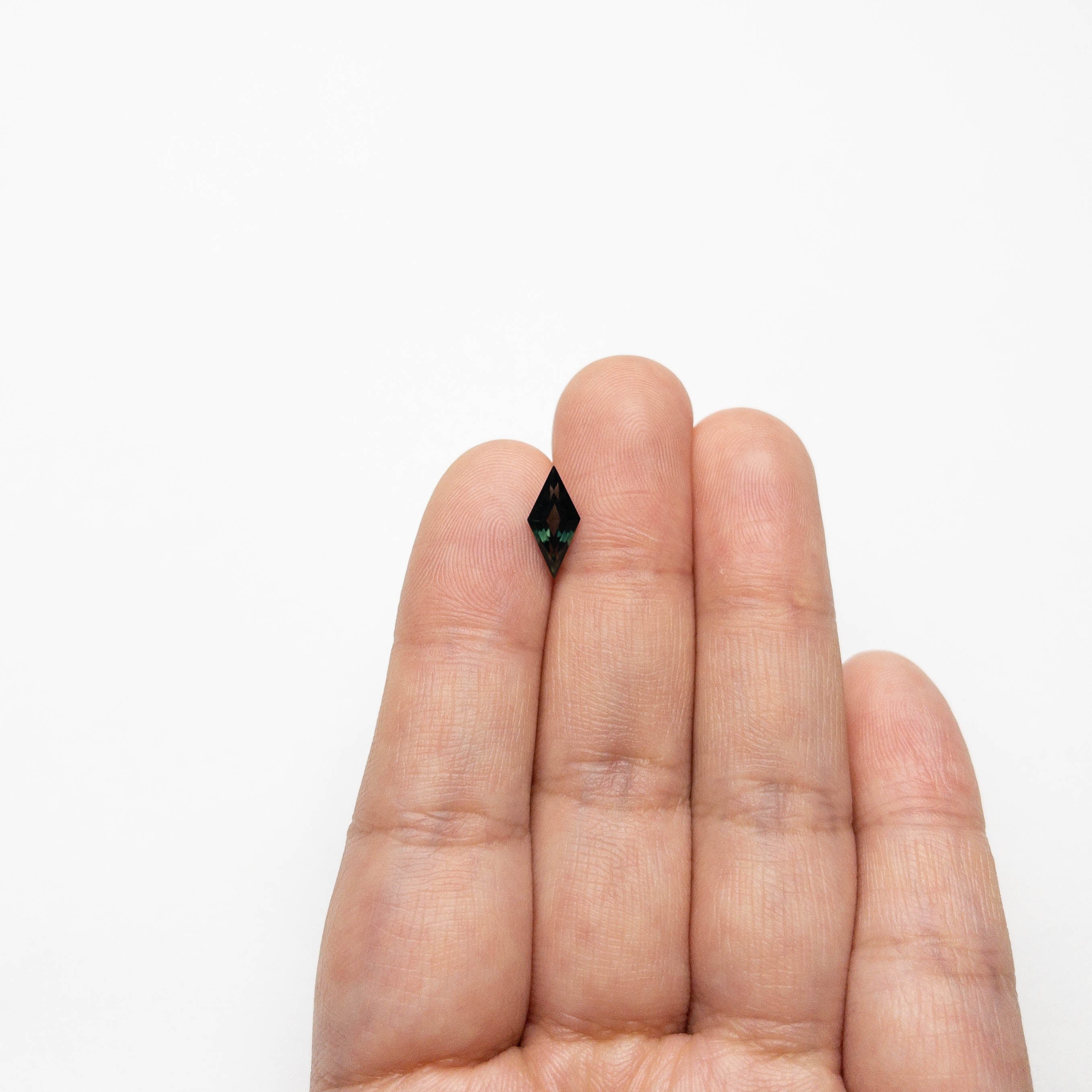 1.04ct 11.66x5.45x3.02mm Lozenge Step Cut Sapphire 22270-04-Staghead Designs