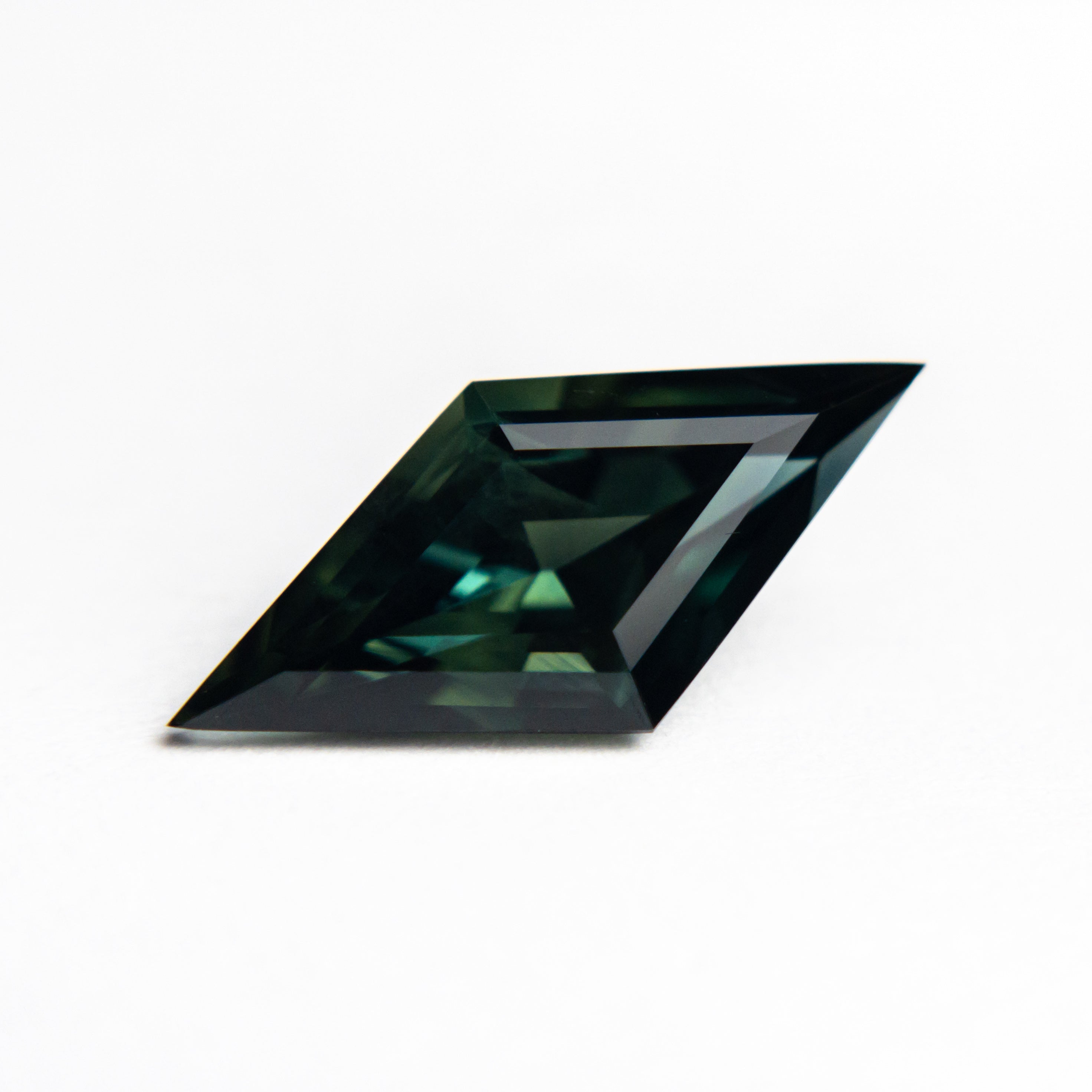 1.85ct 13.82x6.43x4.23mm Lozenge Step Cut Sapphire 22289-01-Staghead Designs