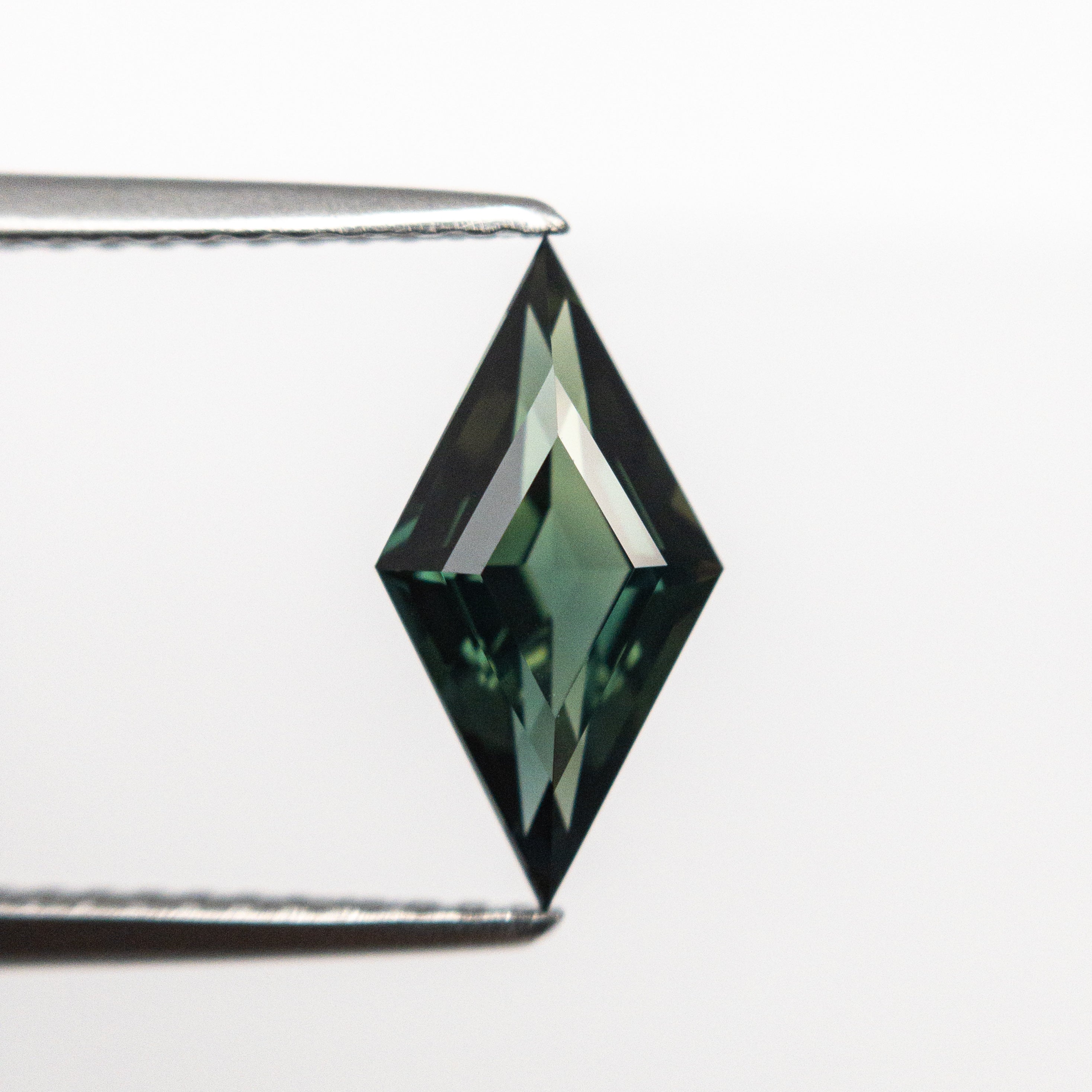 1.26ct 11.48x5.96x3.47mm Lozenge Step Cut Sapphire 22297-02-Staghead Designs