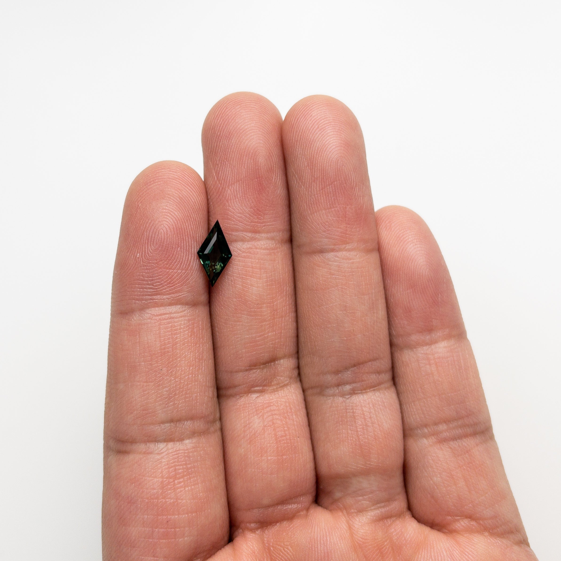 1.26ct 11.48x5.96x3.47mm Lozenge Step Cut Sapphire 22297-02-Staghead Designs