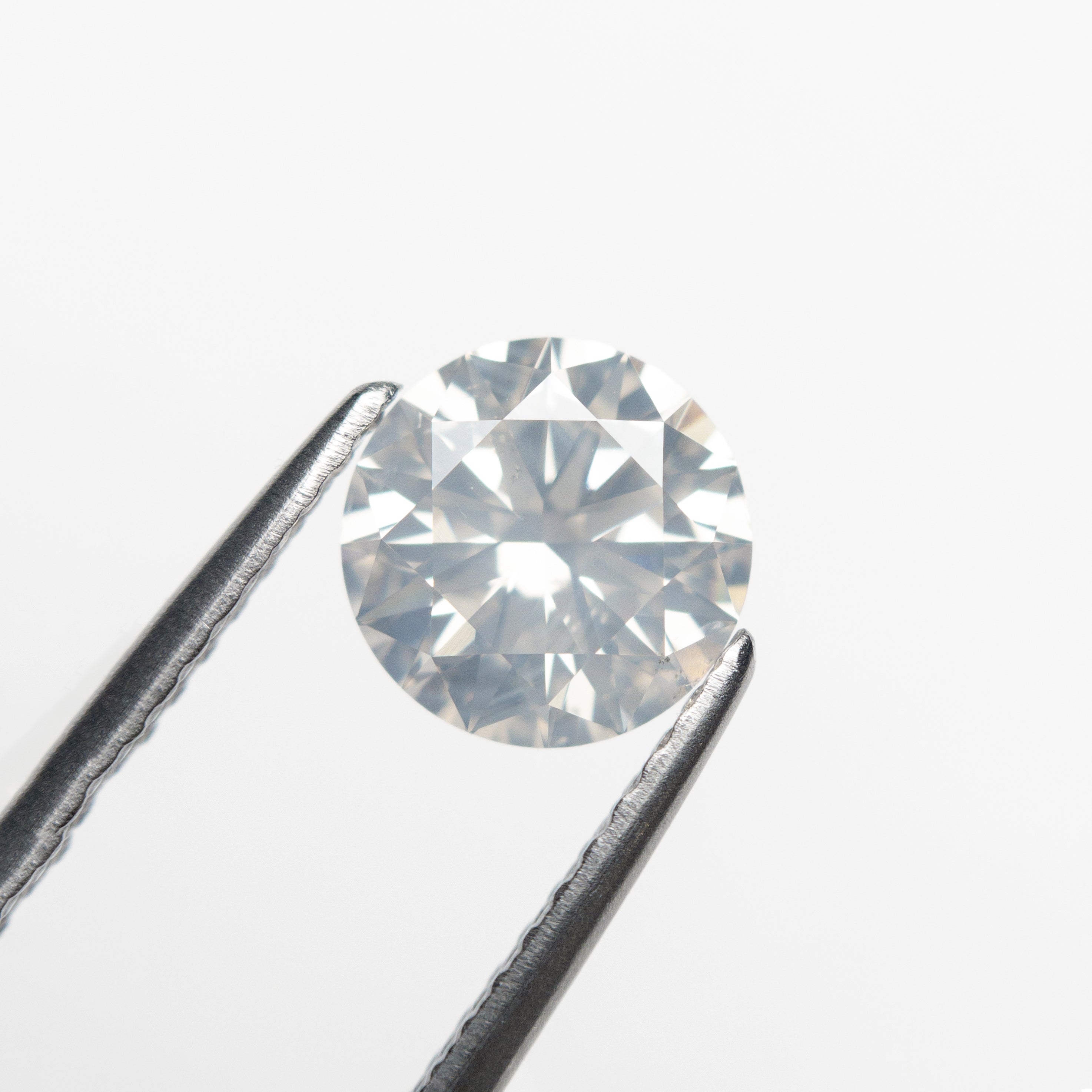 1.20ct 6.87x6.85x4.12mm SI1 Fancy White Round Brilliant 22352-01-Staghead Designs