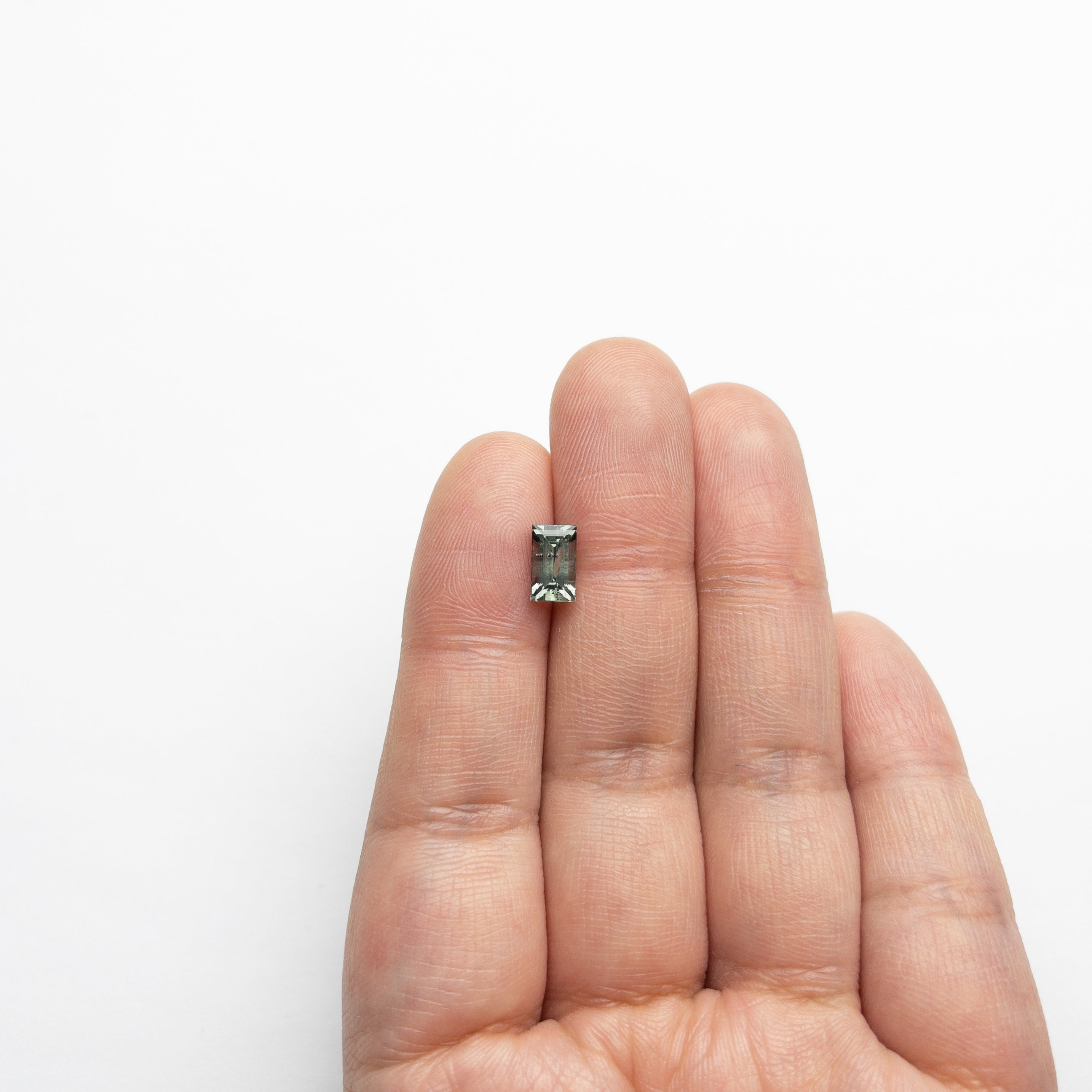 1.73ct 7.94x4.65x4.06mm Rectangle Step Cut Sapphire 22689-08-Staghead Designs