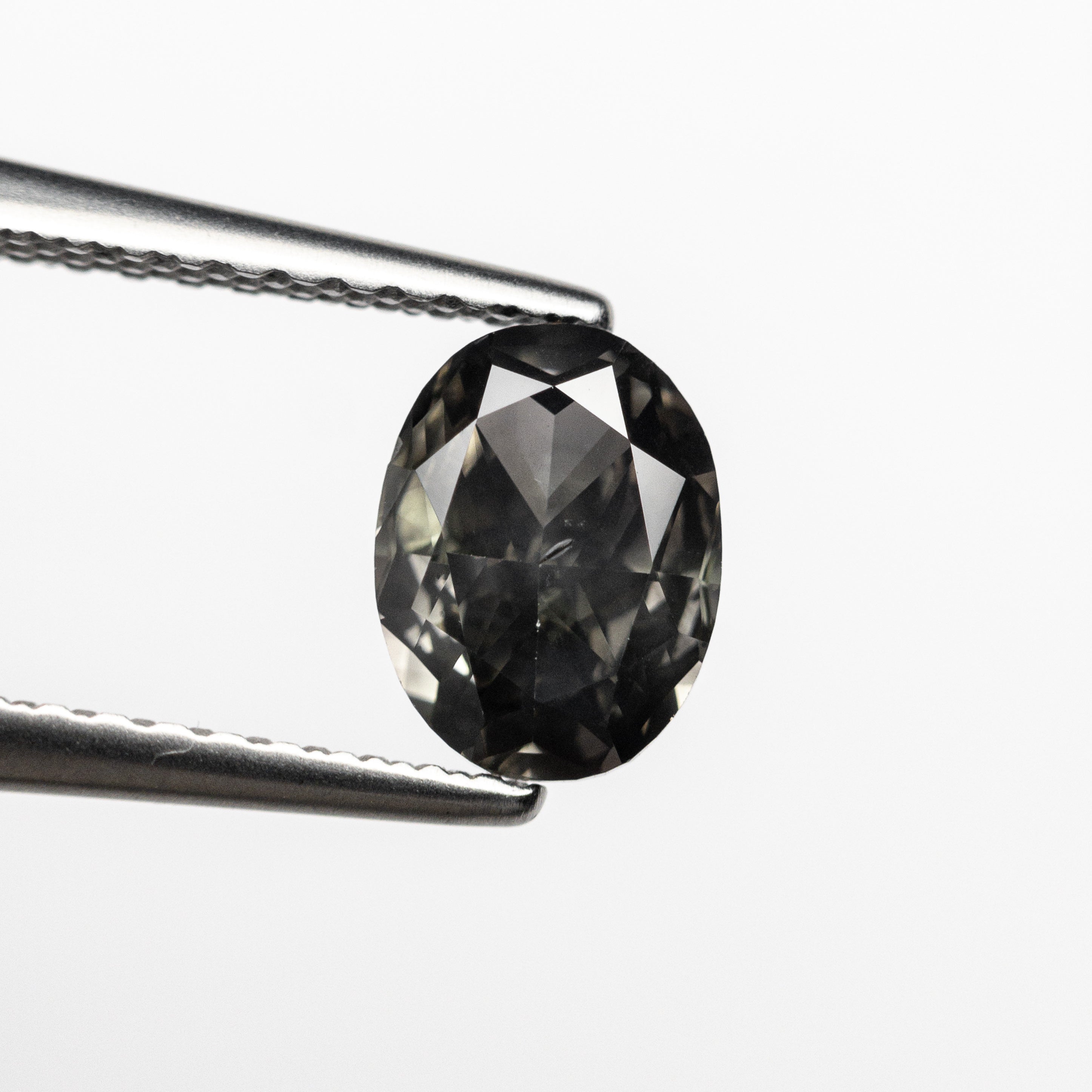 0.77ct 6.75x5.10x2.78mm SI1 Fancy Dark Grey Oval Brilliant 22713-01-Staghead Designs