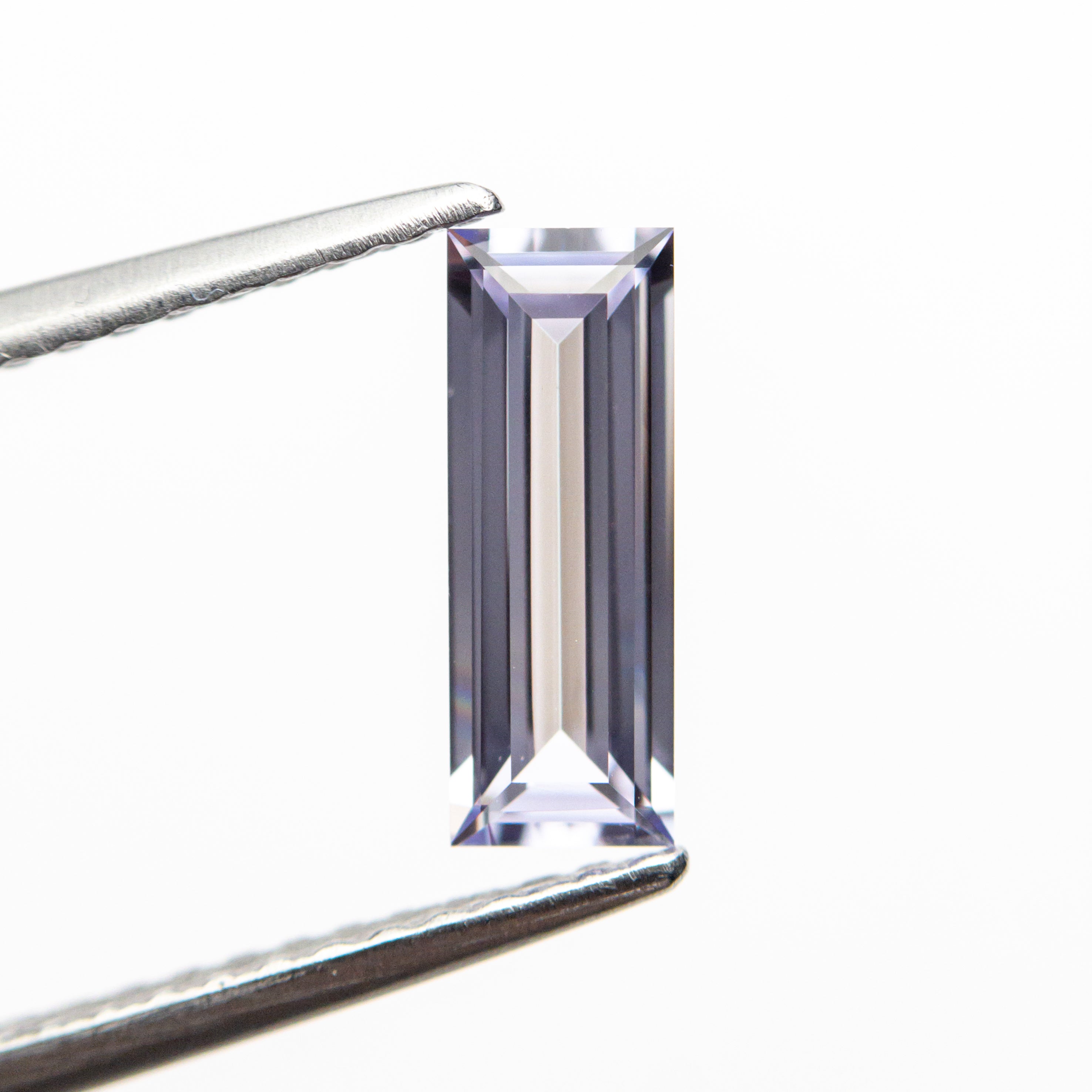 0.71ct 9.01x3.28x2.08mm Rectangle Step Cut Sapphire 22877-01-Staghead Designs