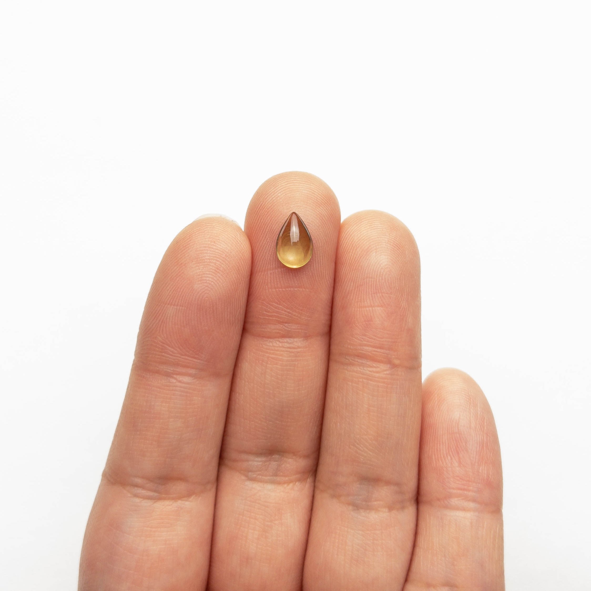 1.24ct 8.57x5.70x2.85mm Pear Cabochon Cut Sapphire 23059-01-Staghead Designs