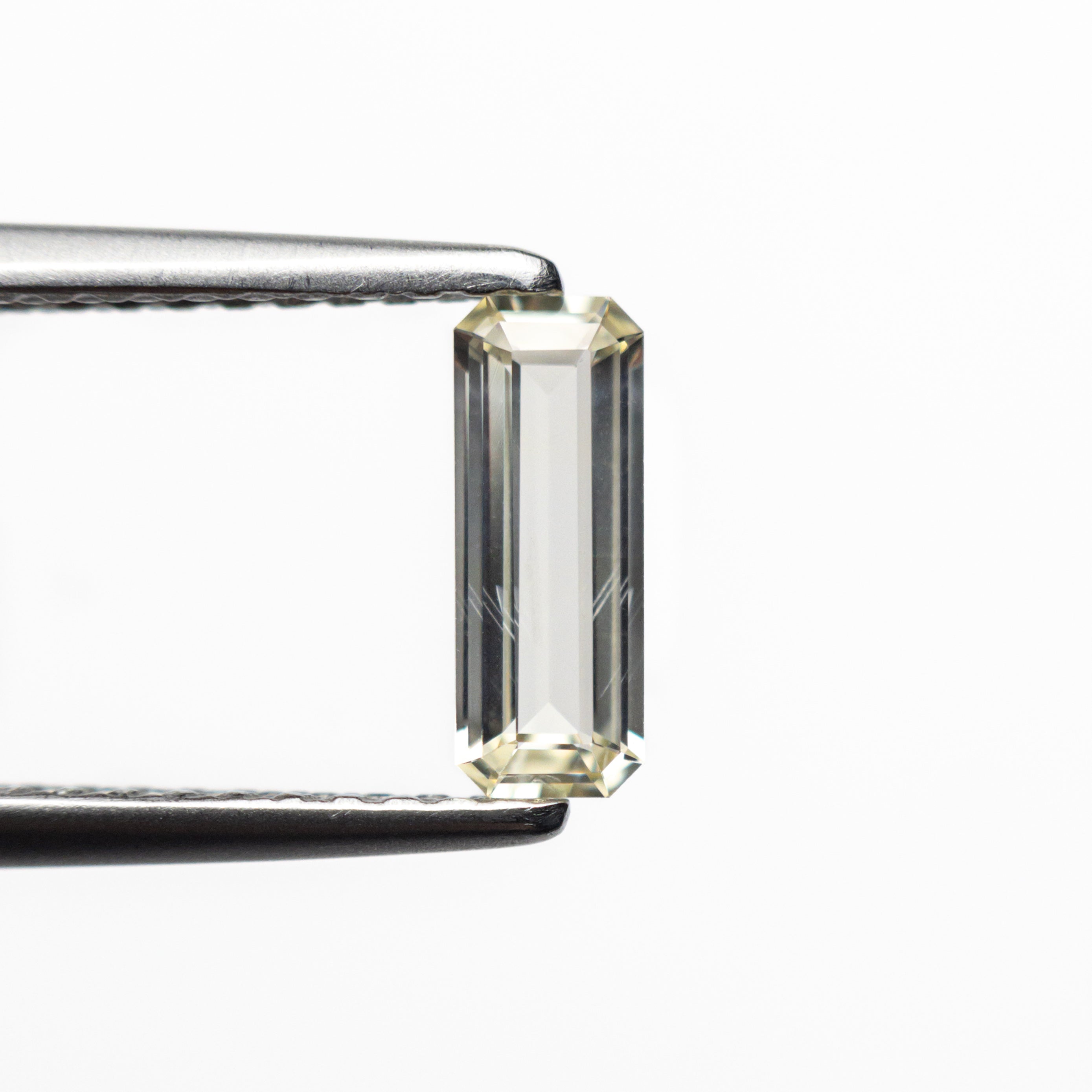 0.49ct 7.89x3.01x1.75mm Cut Corner Rectangle Step Cut Sapphire 23779-05-Staghead Designs