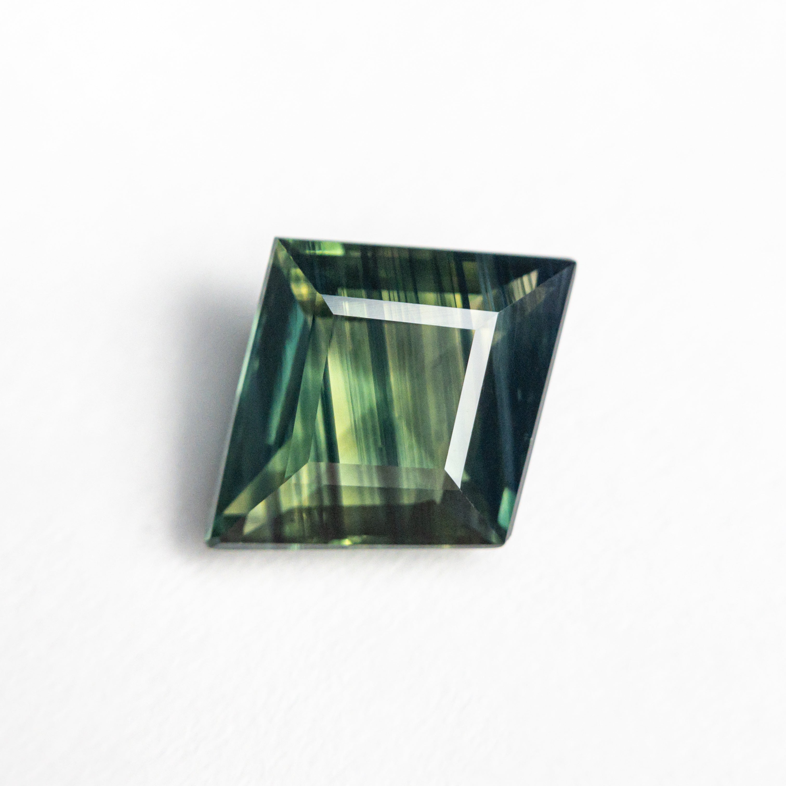 1.74ct 10.01x8.19x3.59mm Lozenge Step Cut Sapphire 23804-02-Staghead Designs