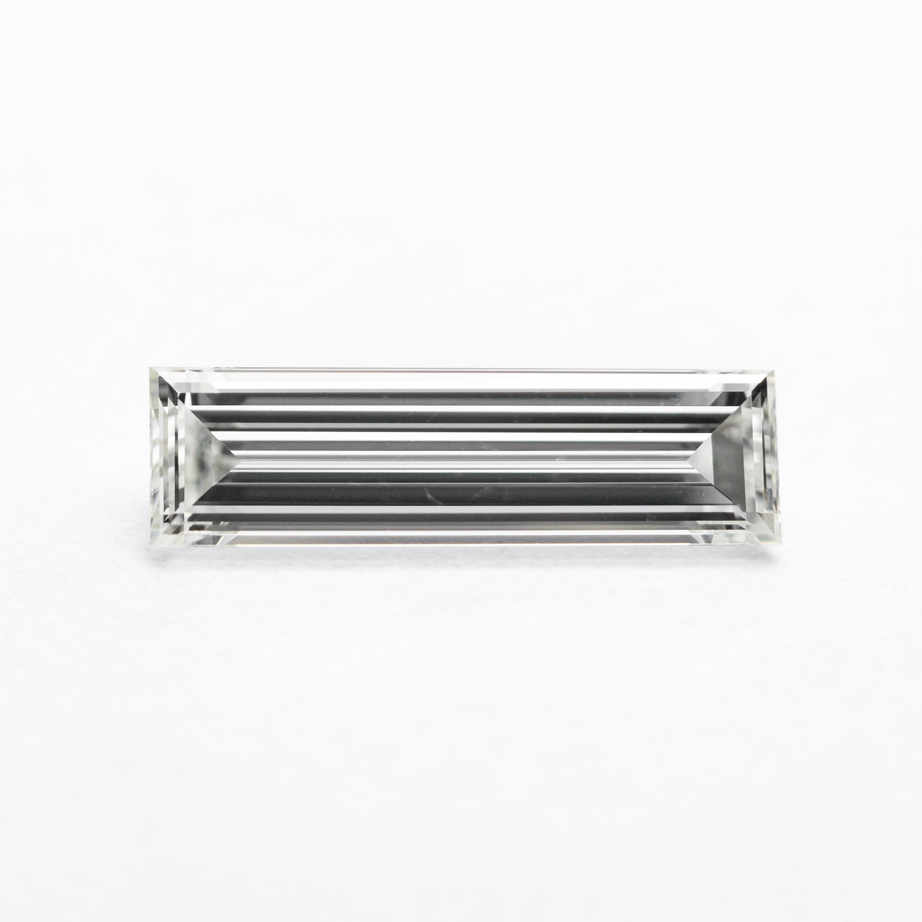0.78ct 11.17x3.24x2.06mm GIA VS2 H Baguette Step Cut 24303-01-Staghead Designs