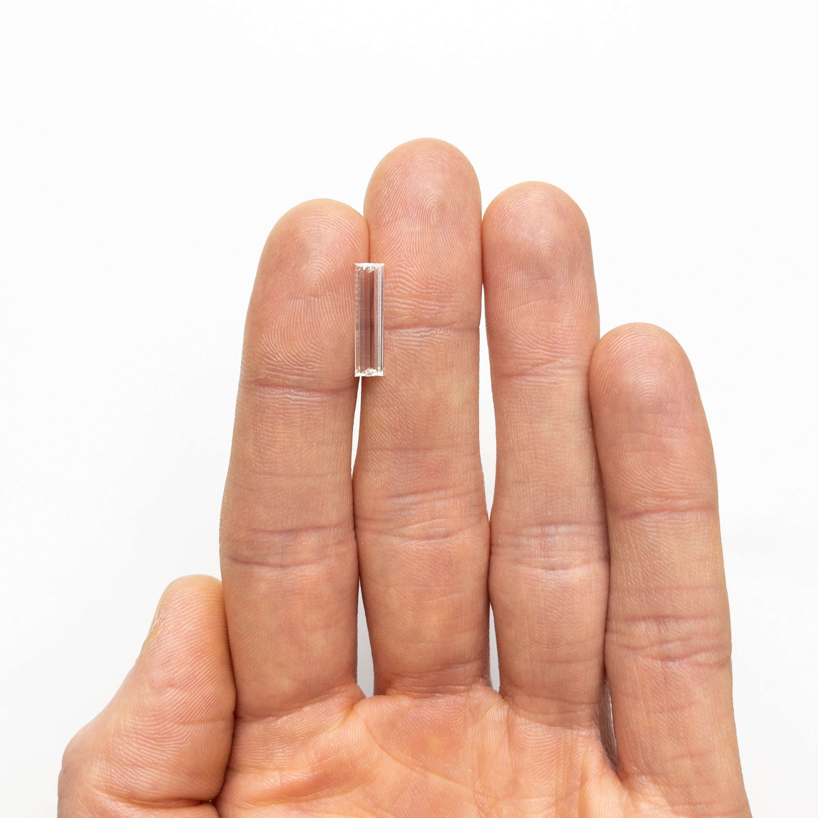 1.10ct 15.57x4.14x1.48mm GIA VS1 J Baguette Step Cut 24305-01-Staghead Designs