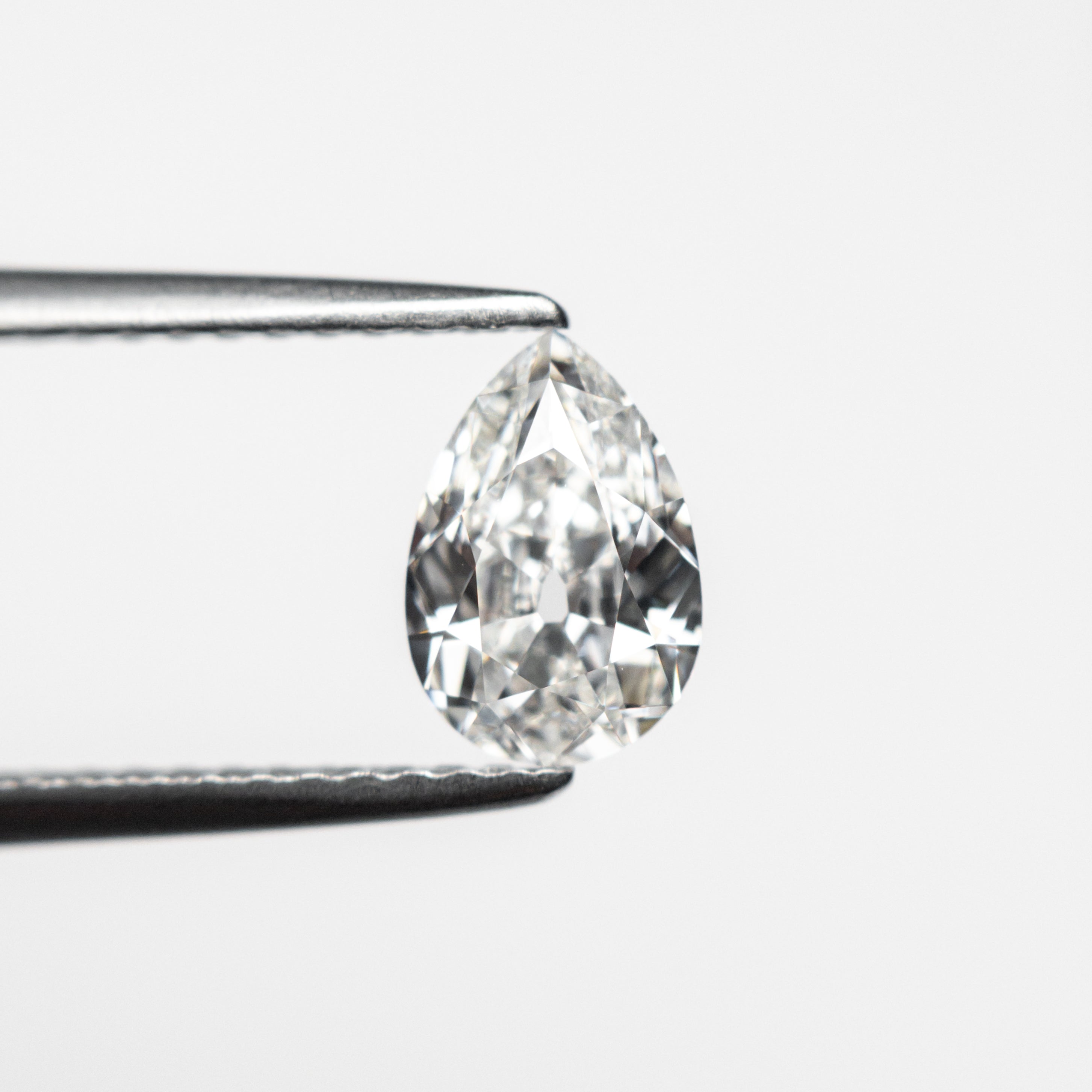 0.71ct 7.35x5.03x2.77mm GIA VVS1 F Pear Brilliant 24447-01-Staghead Designs