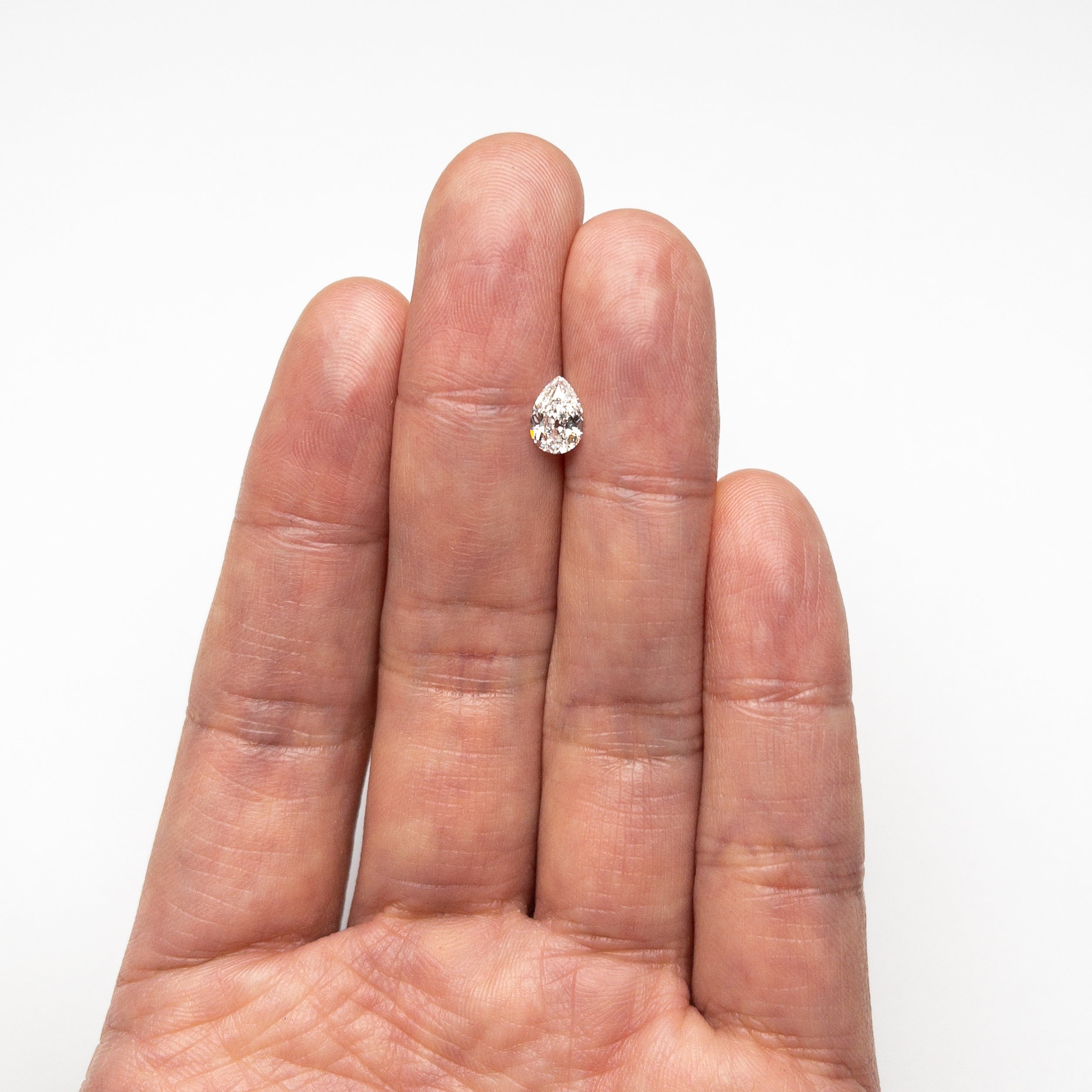 0.71ct 7.35x5.03x2.77mm GIA VVS1 F Pear Brilliant 24447-01-Staghead Designs