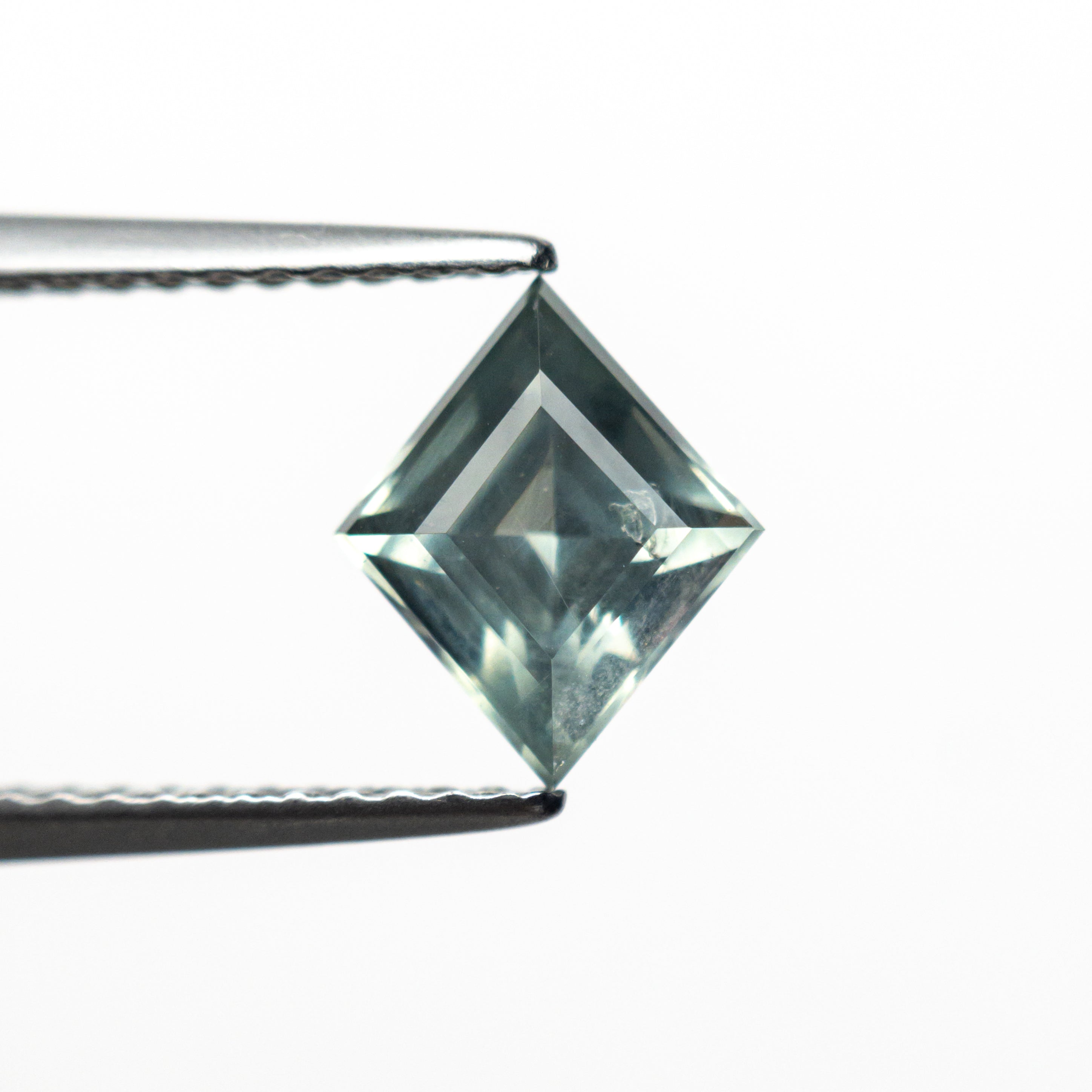 1.25ct 8.44x7.06x4.09mm Lozenge Step Cut Sapphire 25175-14-Staghead Designs