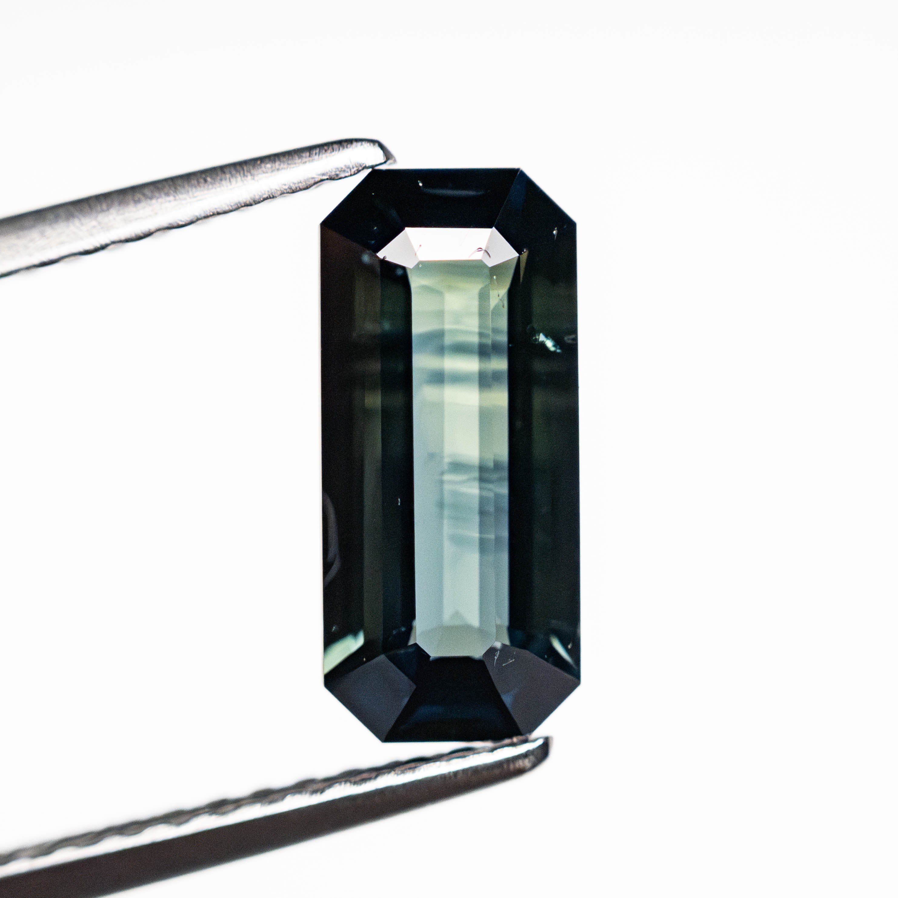 1.62ct 10.33x4.68x3.03mm Cut Corner Rectangle Step Cut Sapphire 25194-01-Staghead Designs