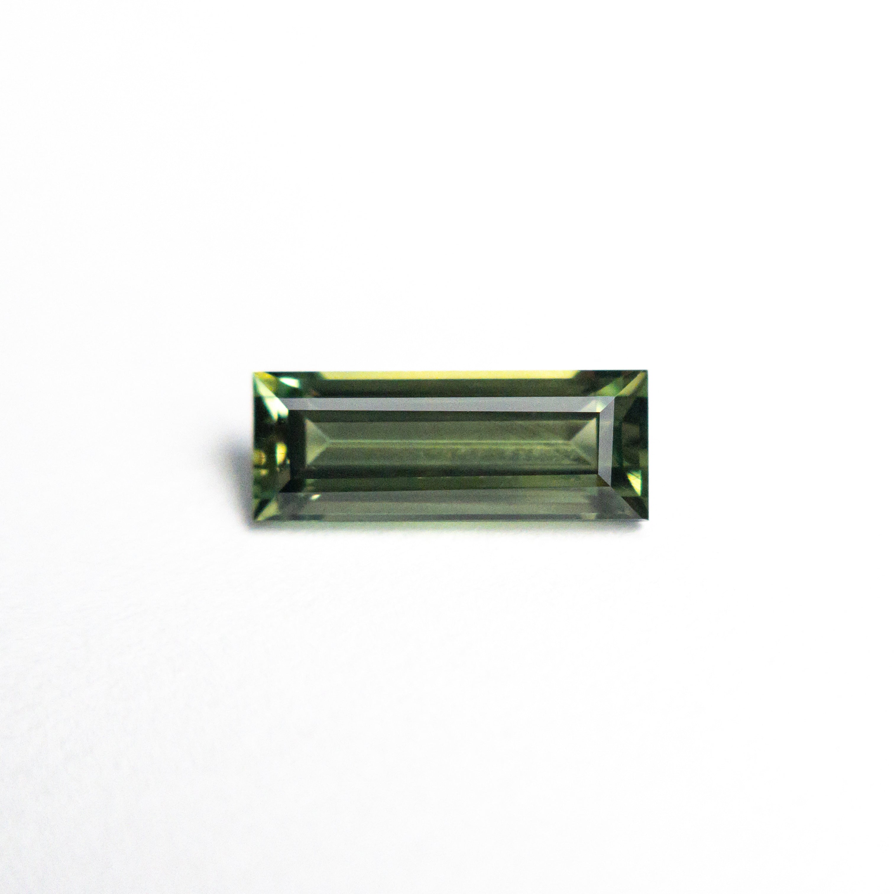 0.85ct 8.45x3.22x2.61mm Rectangle Step Cut Sapphire 25740-03-Staghead Designs