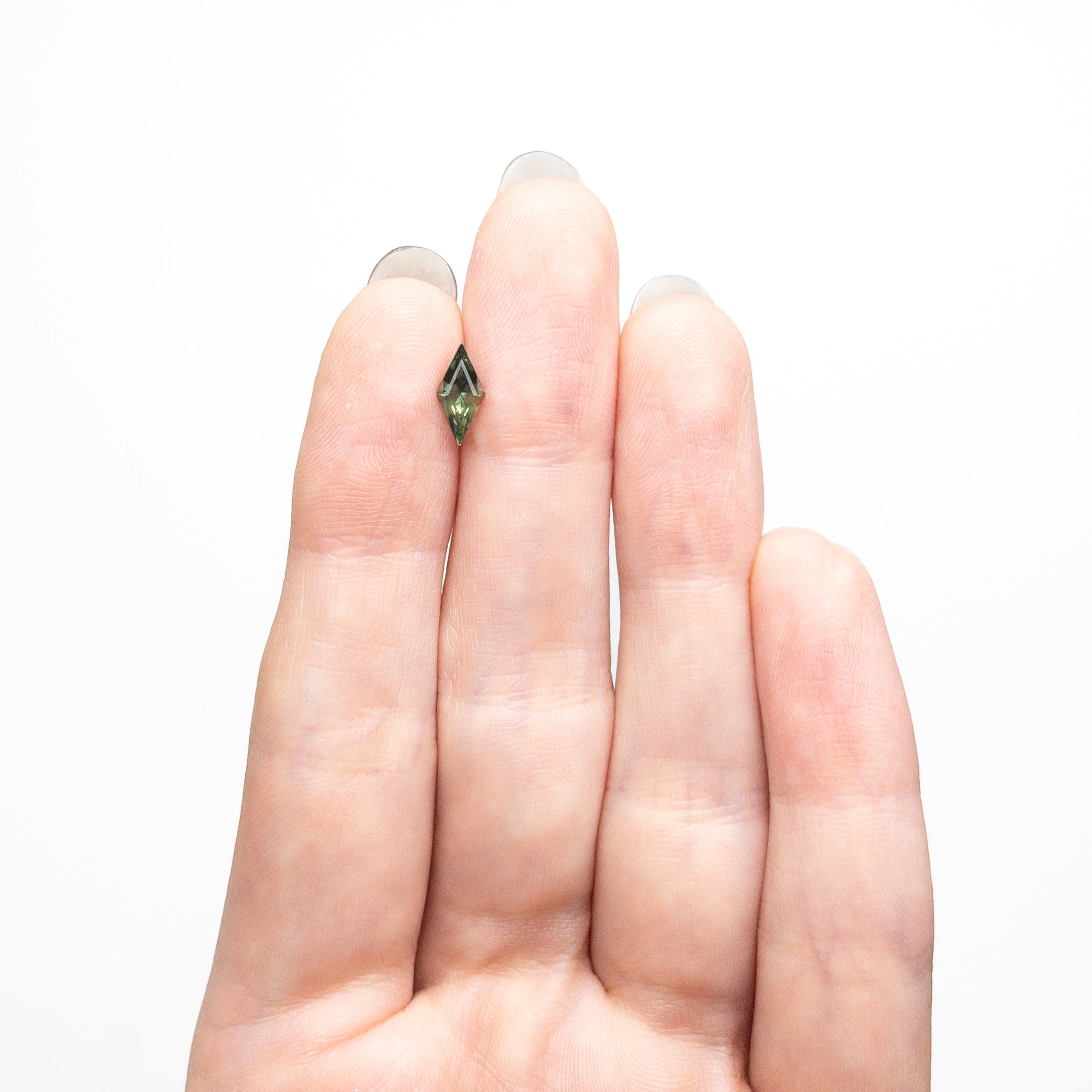 0.62ct 8.76x4.28x3.13mm Lozenge Step Cut Sapphire 25740-04-Staghead Designs