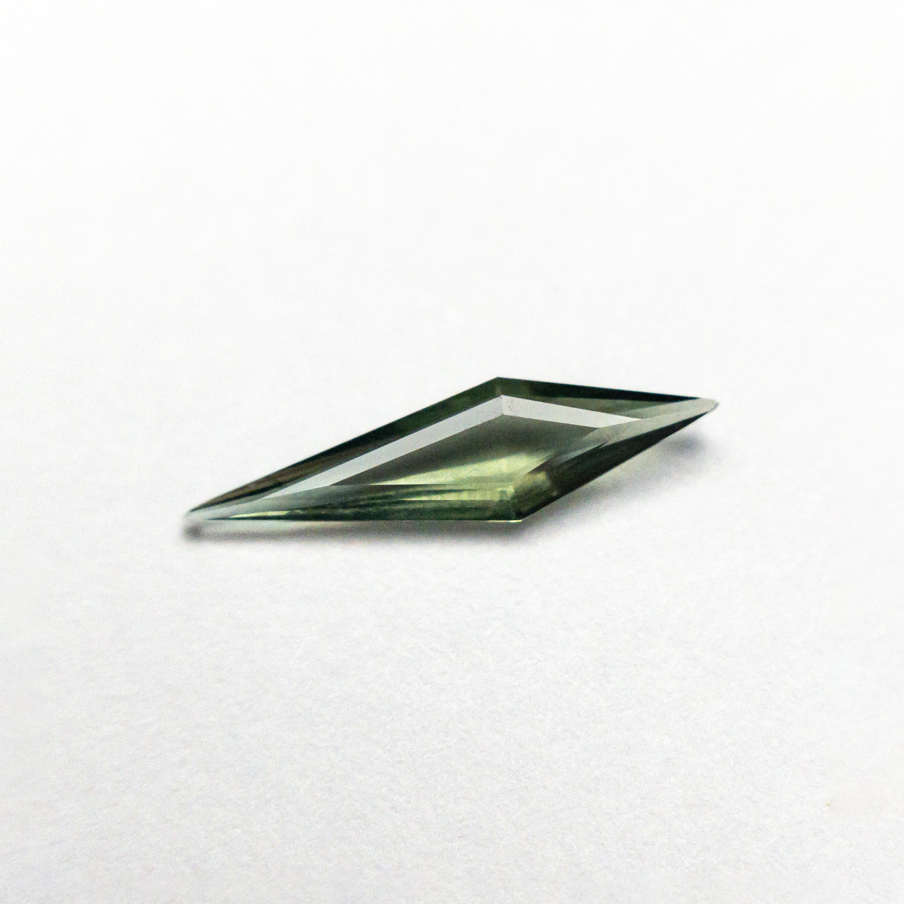0.35ct 11.64x3.08x1.53mm Kite Step Cut Sapphire 25740-16-Staghead Designs