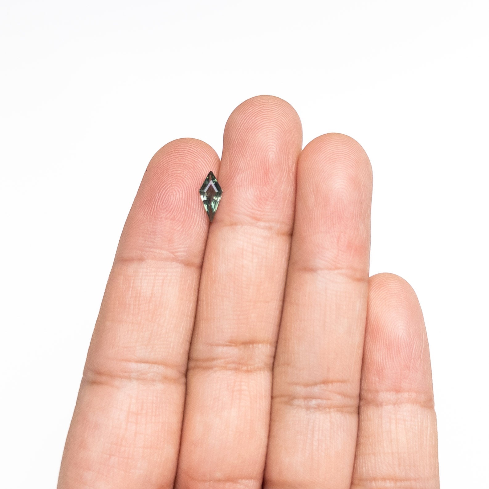 0.56ct 9.56x4.48x2.27mm Kite Step Cut Sapphire 25740-24-Staghead Designs