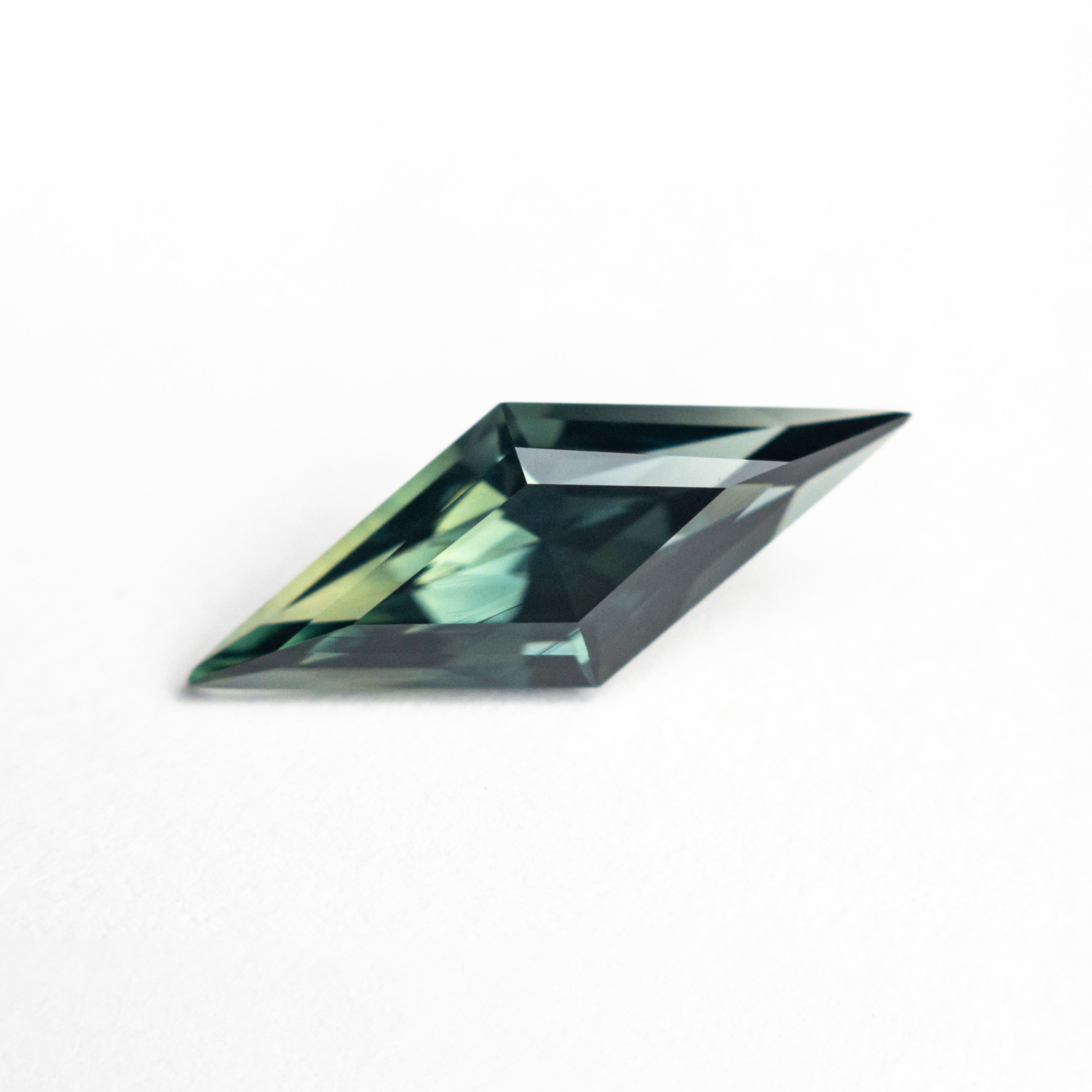 1.36ct 13.58x5.28x3.78mm Lozenge Step Cut Sapphire 25763-01-Staghead Designs