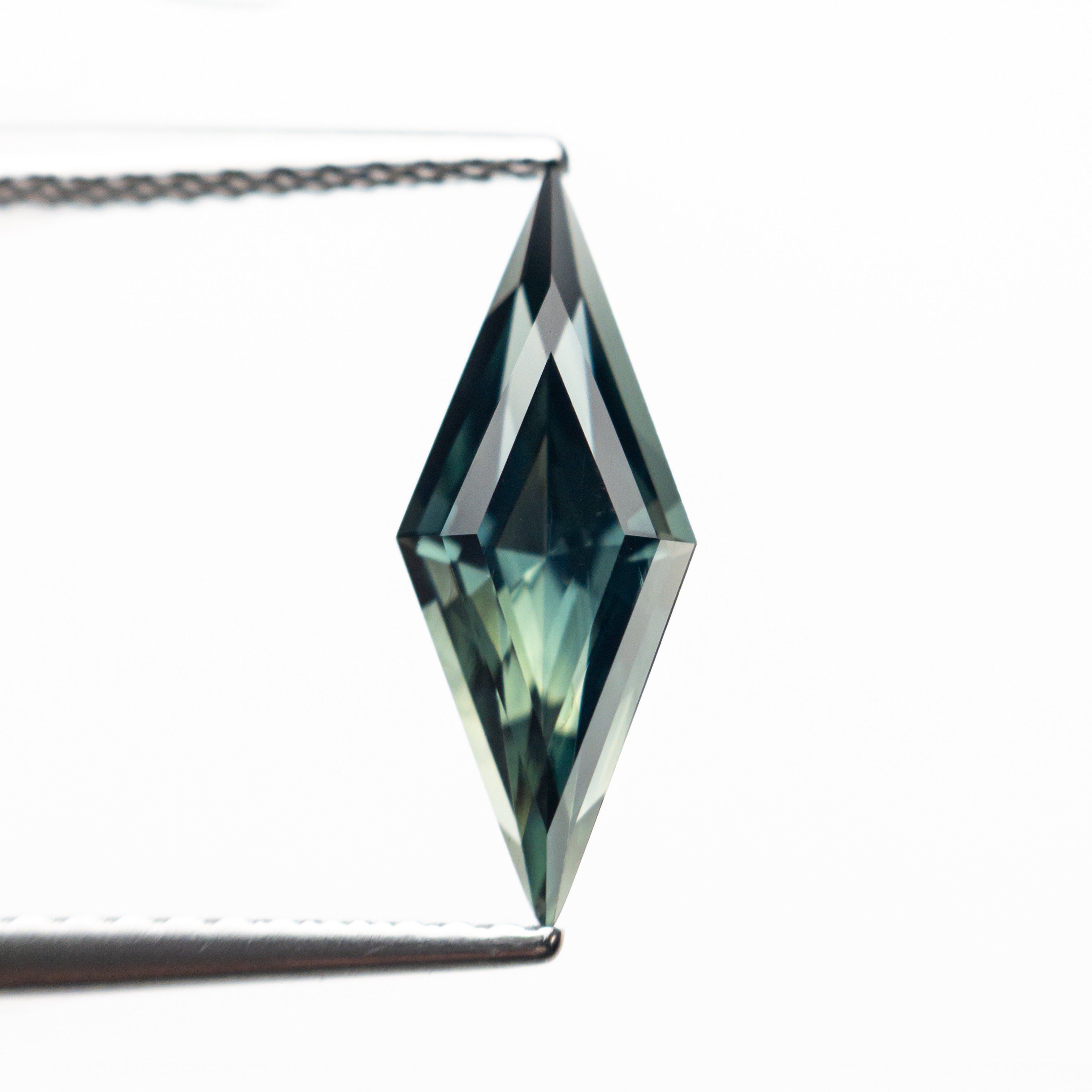 1.36ct 13.58x5.28x3.78mm Lozenge Step Cut Sapphire 25763-01-Staghead Designs