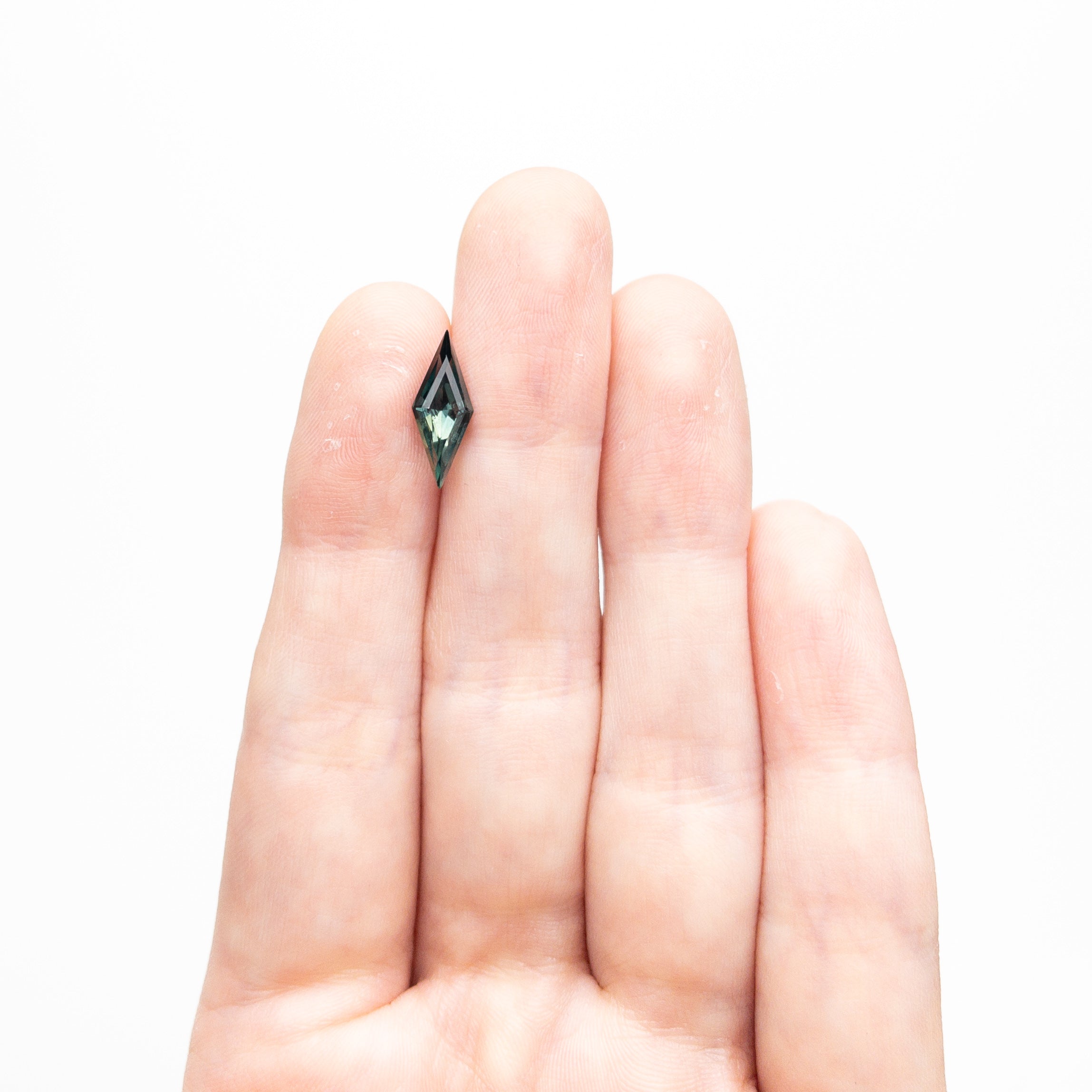 1.36ct 13.58x5.28x3.78mm Lozenge Step Cut Sapphire 25763-01-Staghead Designs