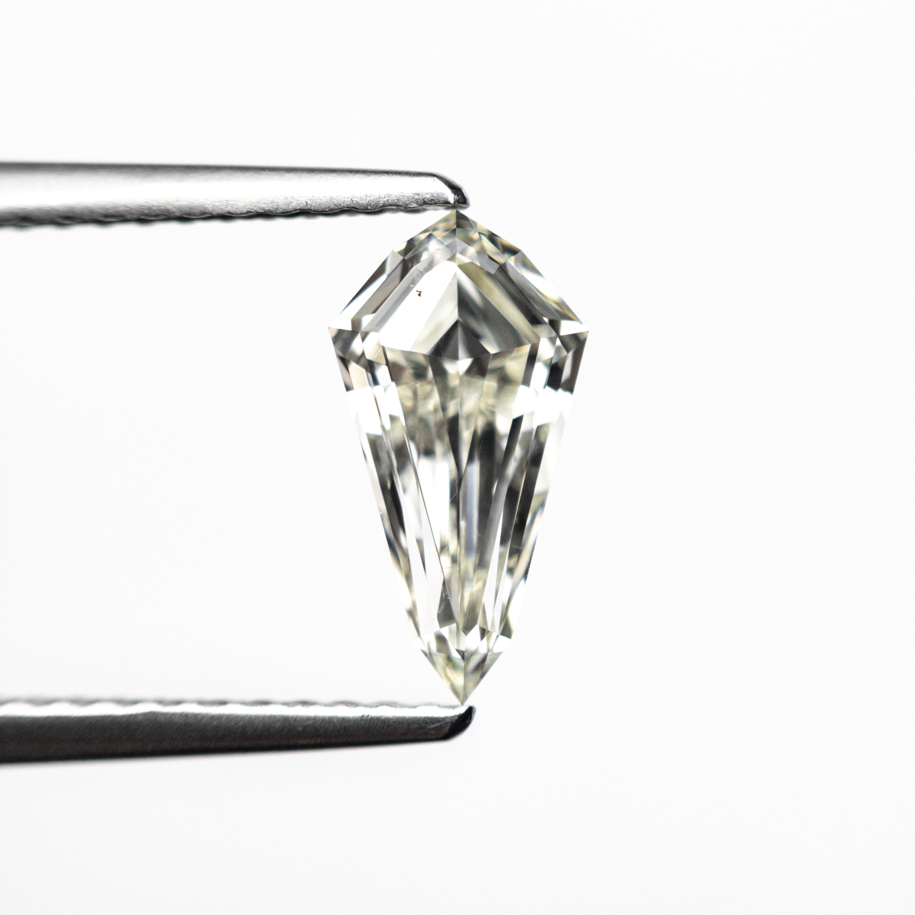 0.91ct 9.95x5.23x2.88mm SI1 K Shield Step Cut 25955-01-Staghead Designs