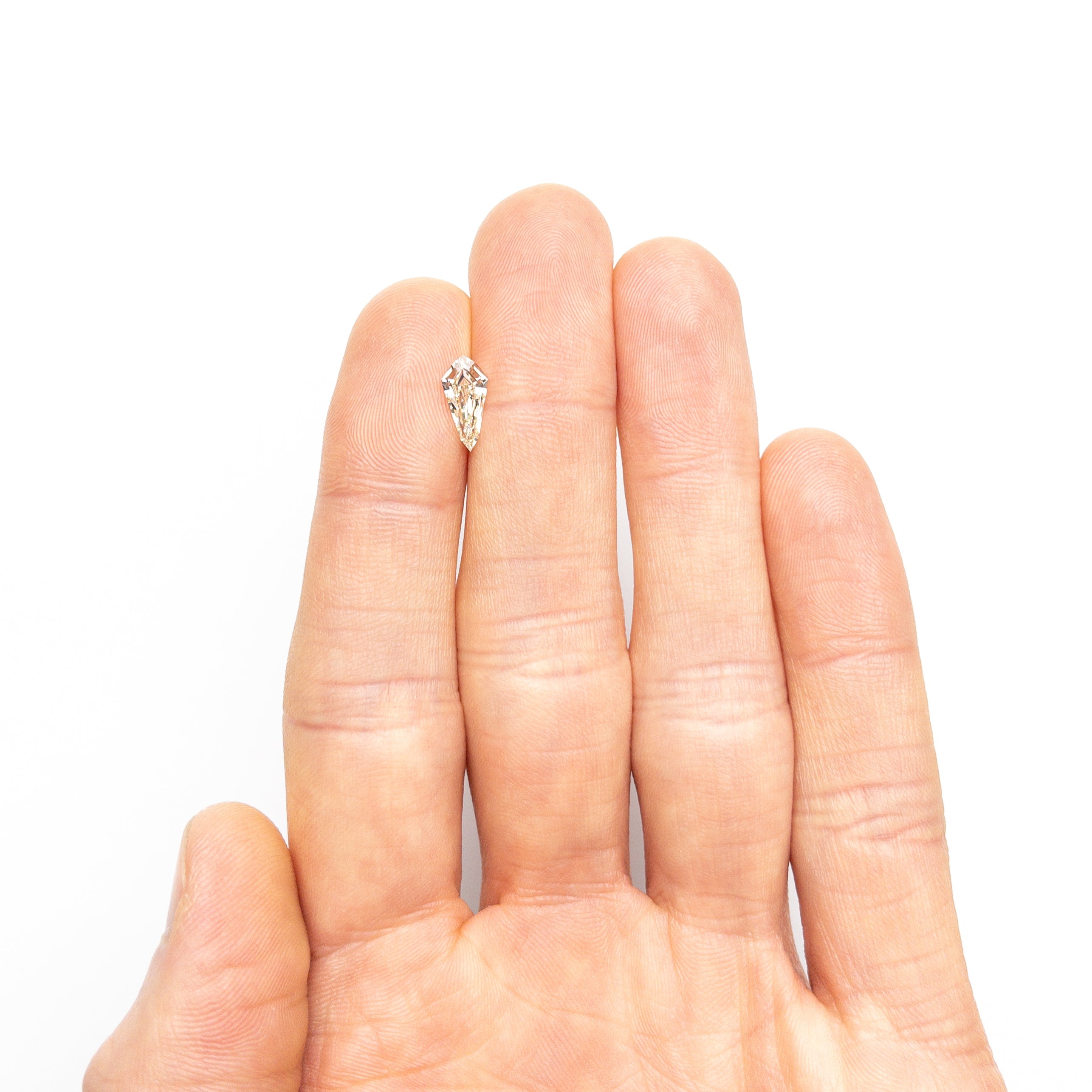 1.00ct 10.72x5.26x3.06mm SI1 M-N Shield Step Cut 25956-02-Staghead Designs