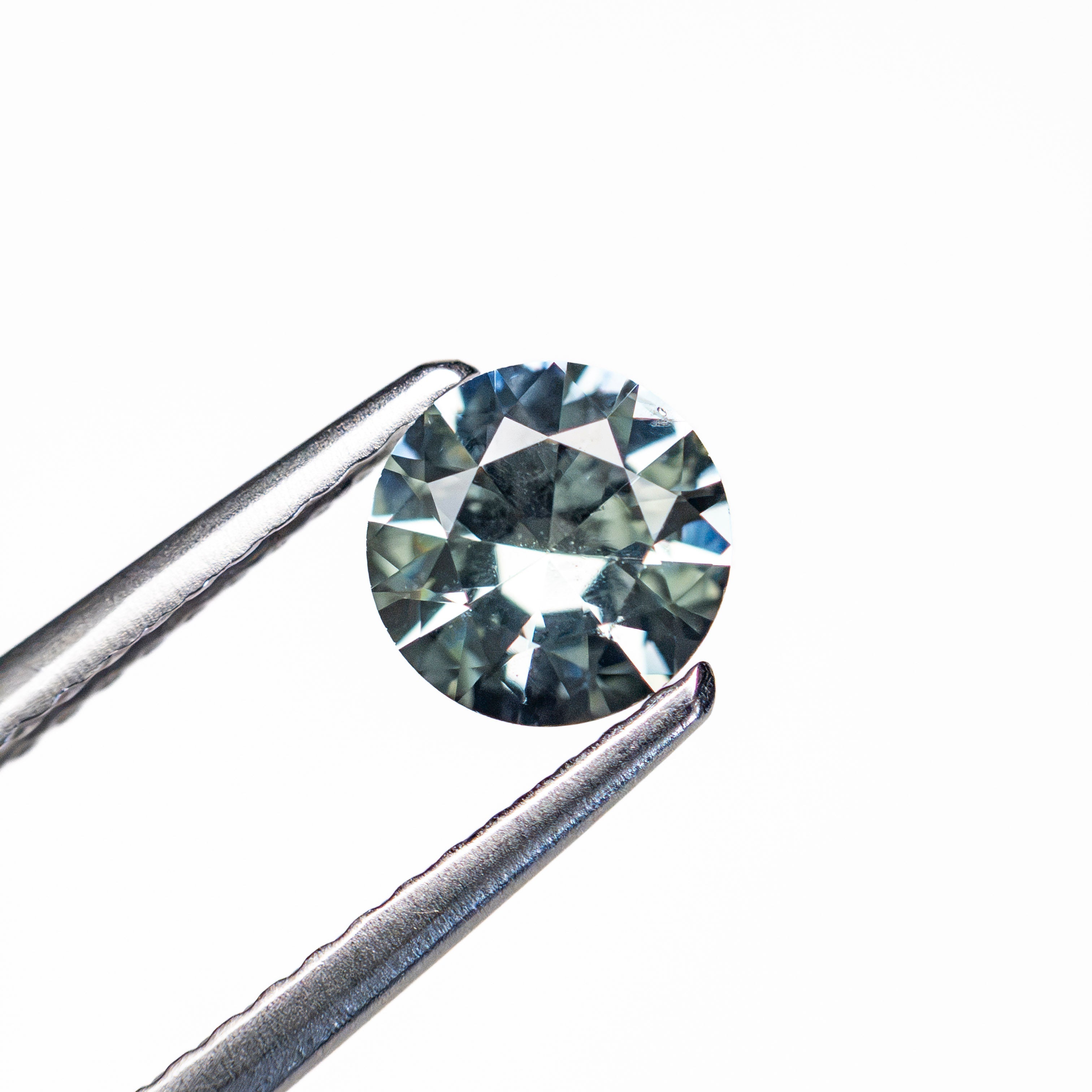 0.67ct 5.58x5.59x3.18mm Round Brilliant Sapphire 26134-14-Staghead Designs