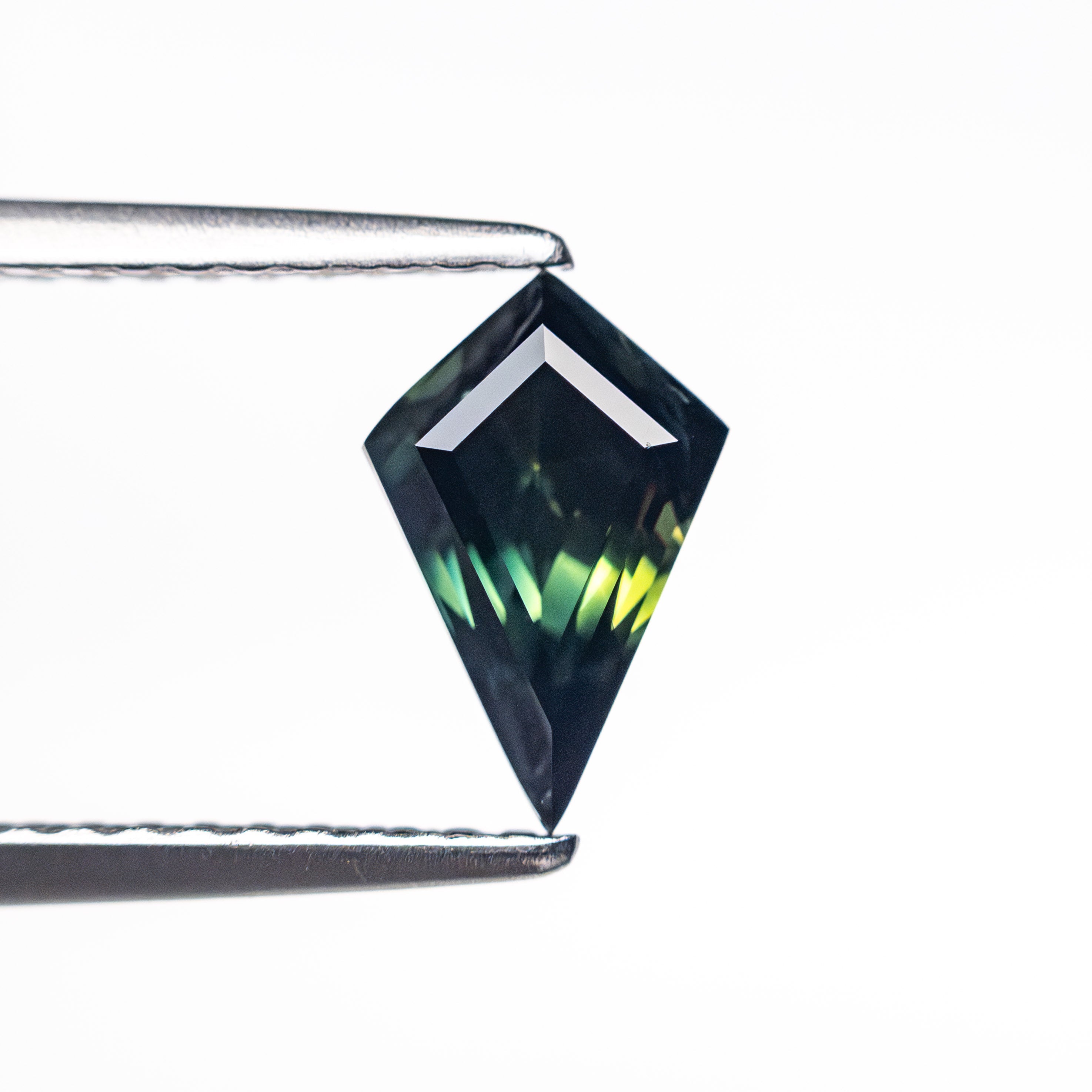 0.91ct 8.39x5.40x3.77mm Kite Step Cut Sapphire 26516-05-Staghead Designs