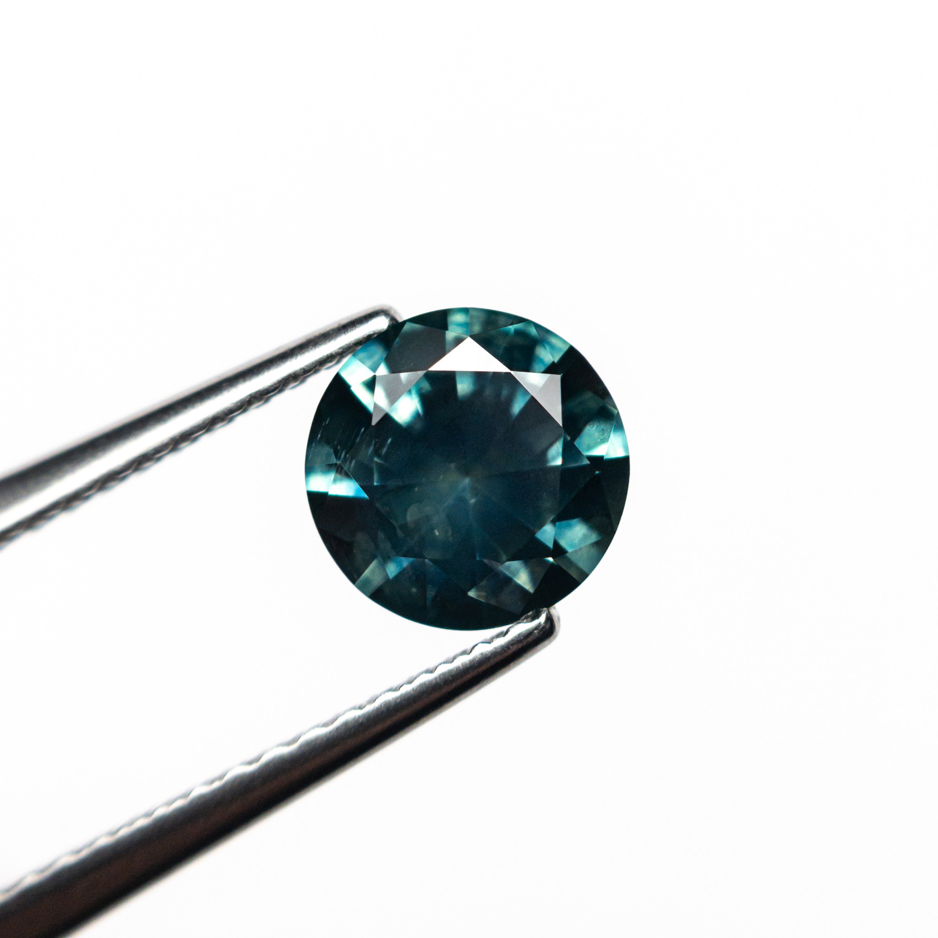1.23ct 6.53x6.49x4.08mm Round Brilliant Sapphire 26524-01-Staghead Designs