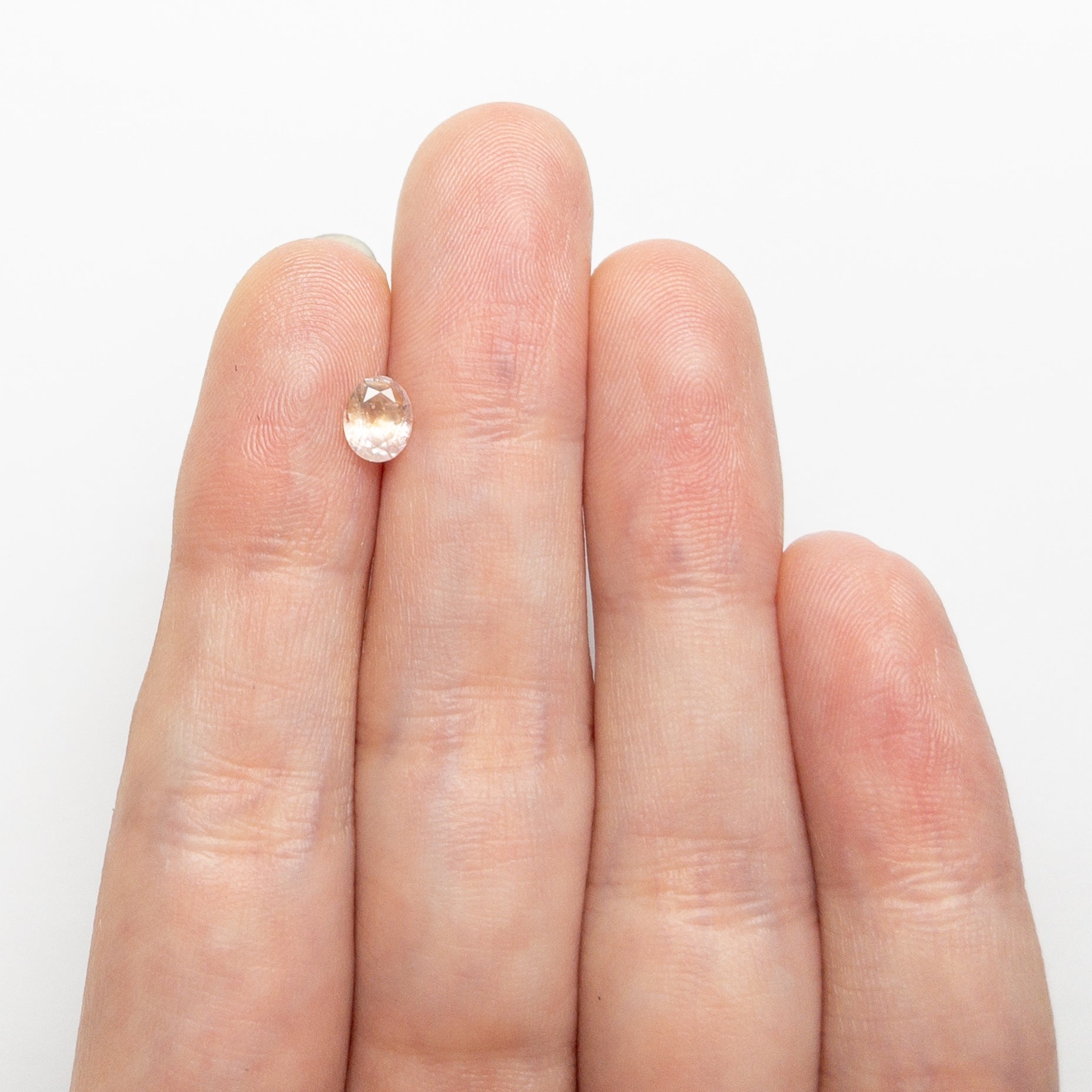 0.60ct 5.78x4.71x2.98mm Oval Brilliant Sapphire 26668-09-Staghead Designs