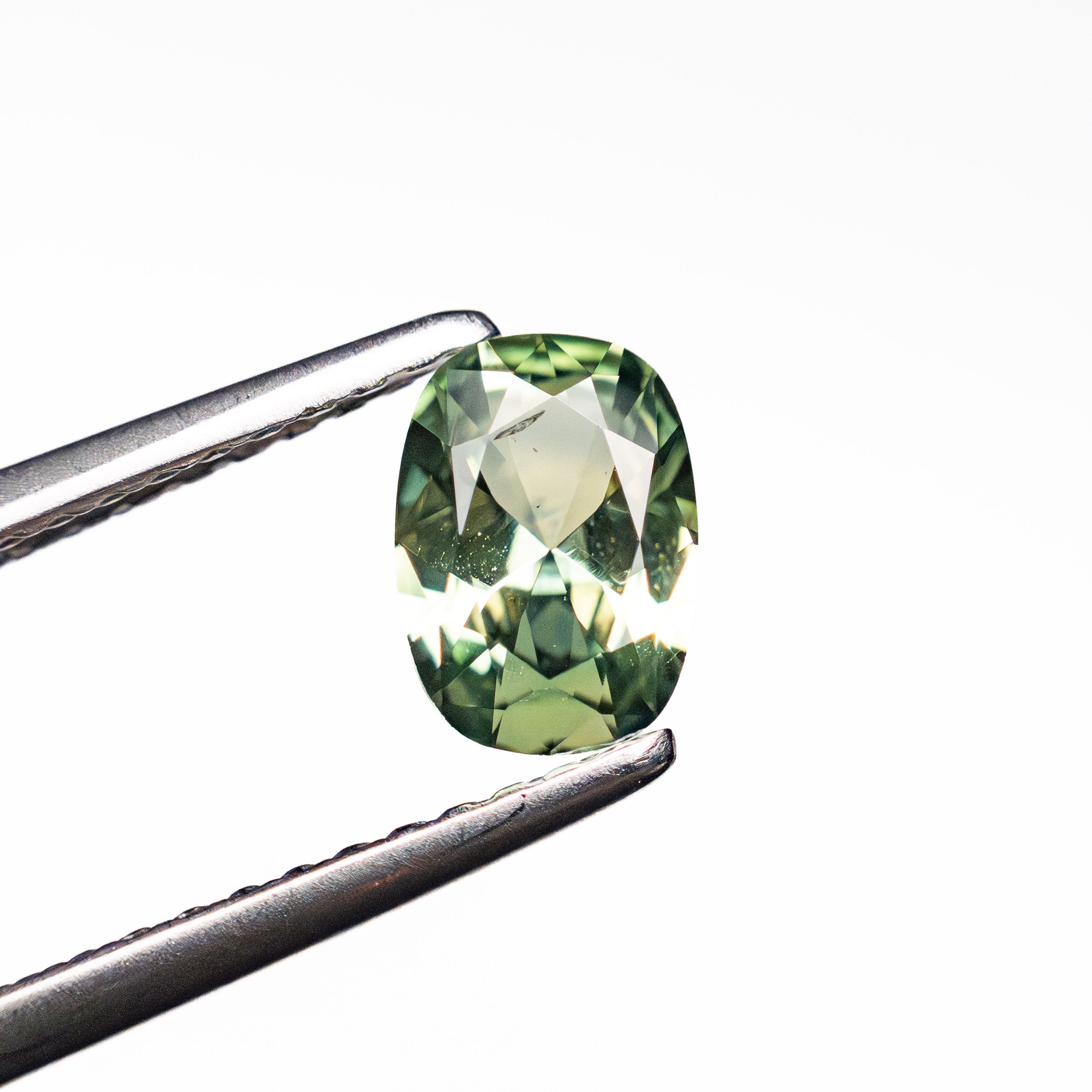 0.69ct 6.48x4.62x2.83mm Cushion Brilliant Sapphire 26673-01-Staghead Designs