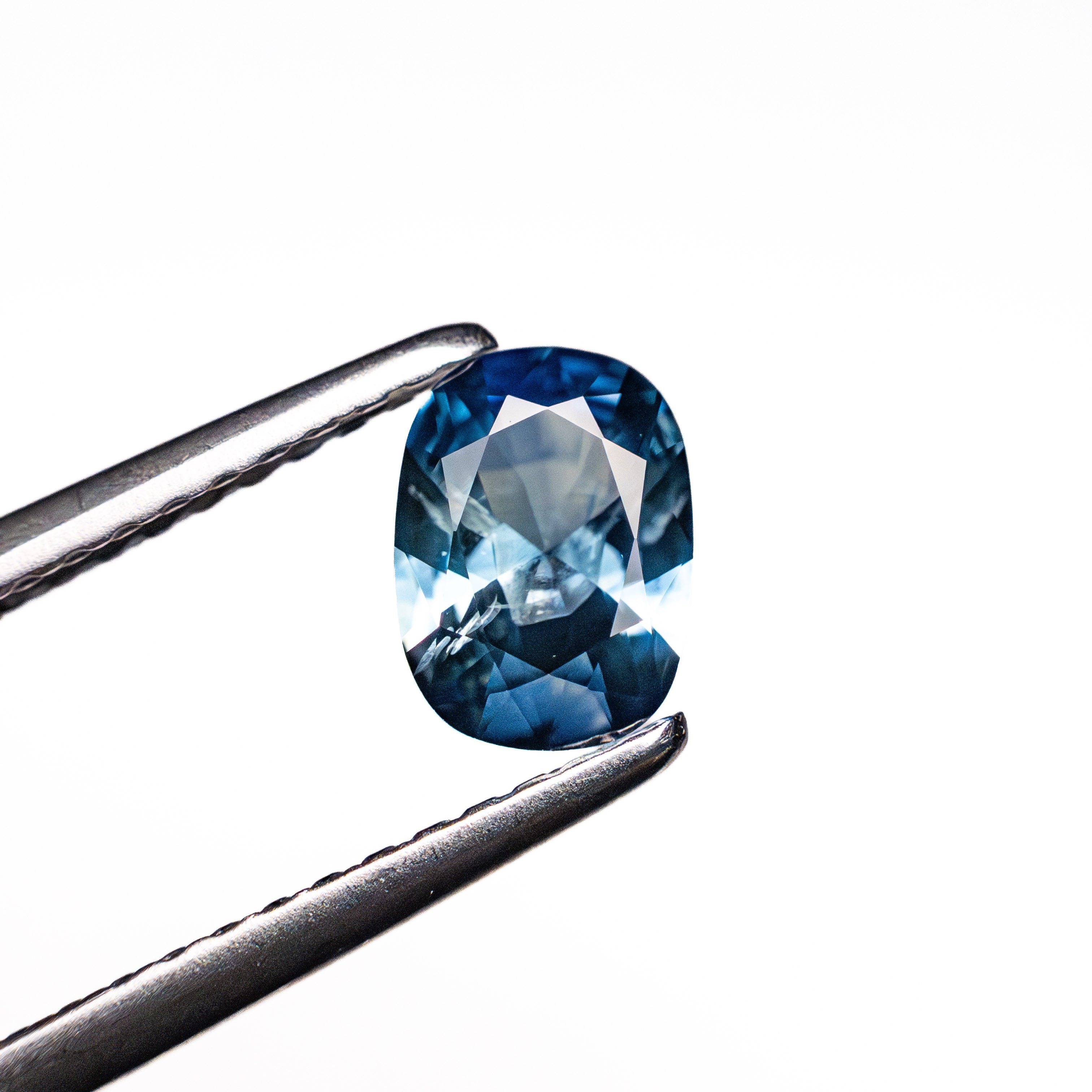 0.64ct 6.32x4.62x2.69mm Cushion Brilliant Sapphire 26673-11-Staghead Designs