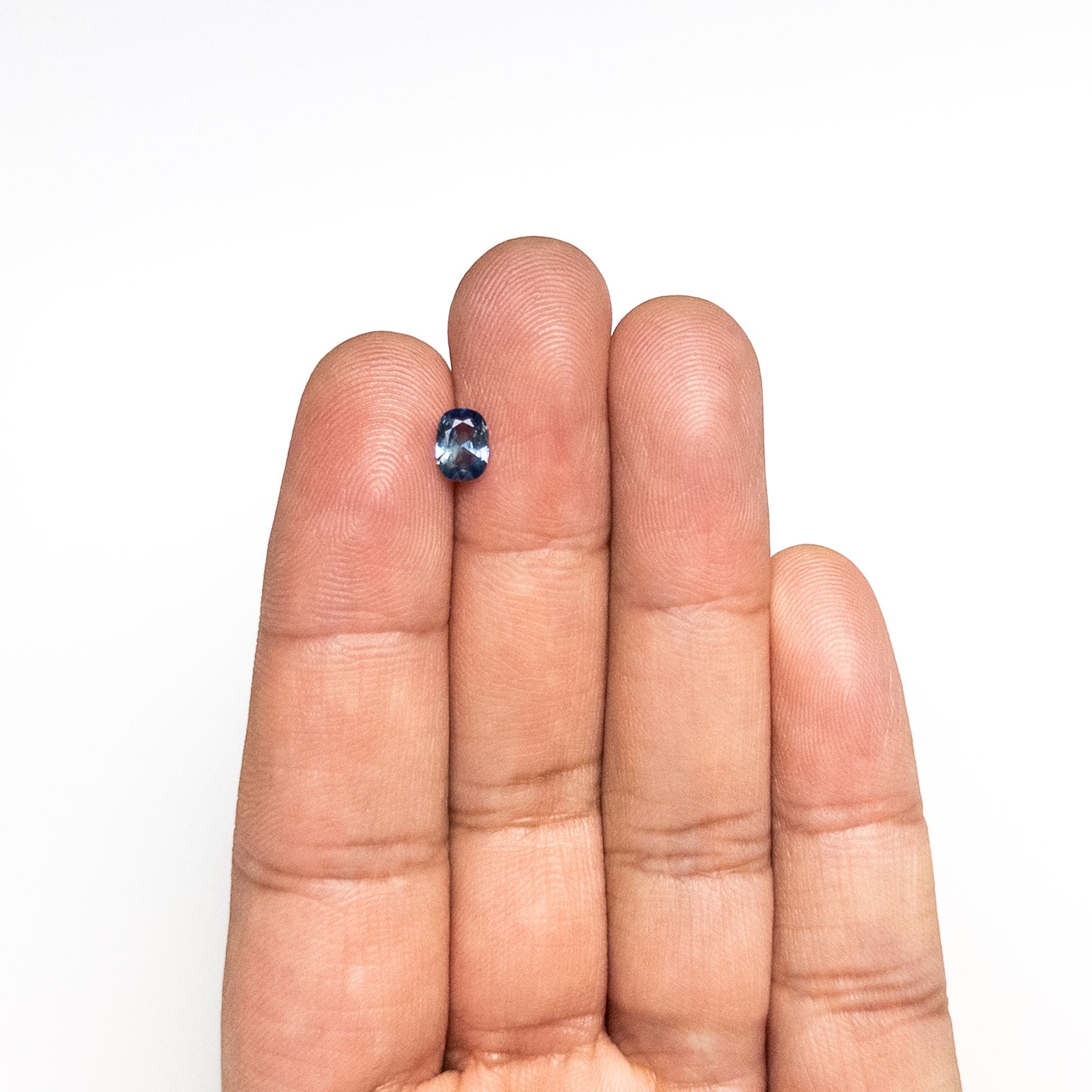 0.64ct 6.32x4.62x2.69mm Cushion Brilliant Sapphire 26673-11-Staghead Designs