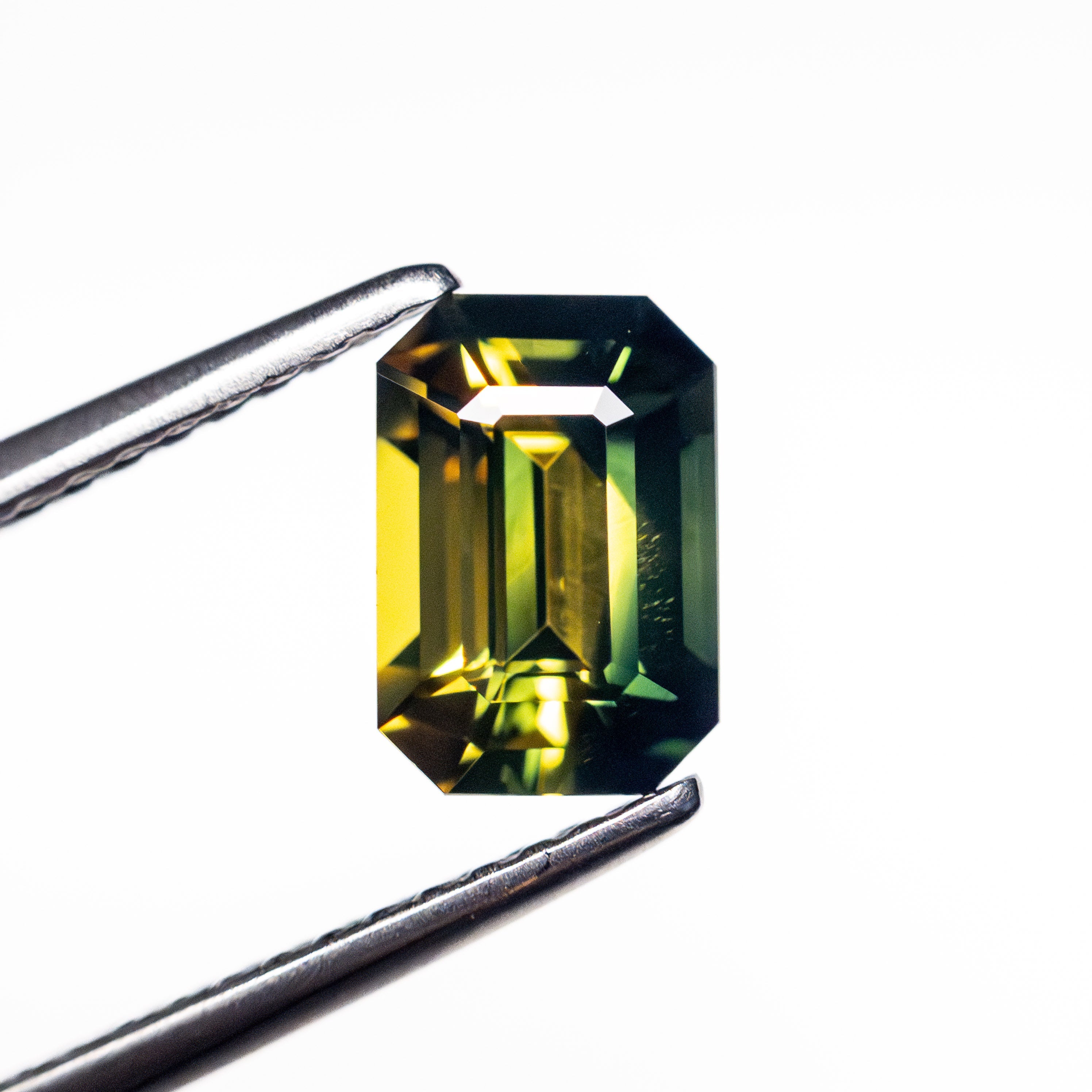 1.55ct 7.64x5.24x4.02mm Cut Corner Rectangle Step Cut Sapphire 26722-02