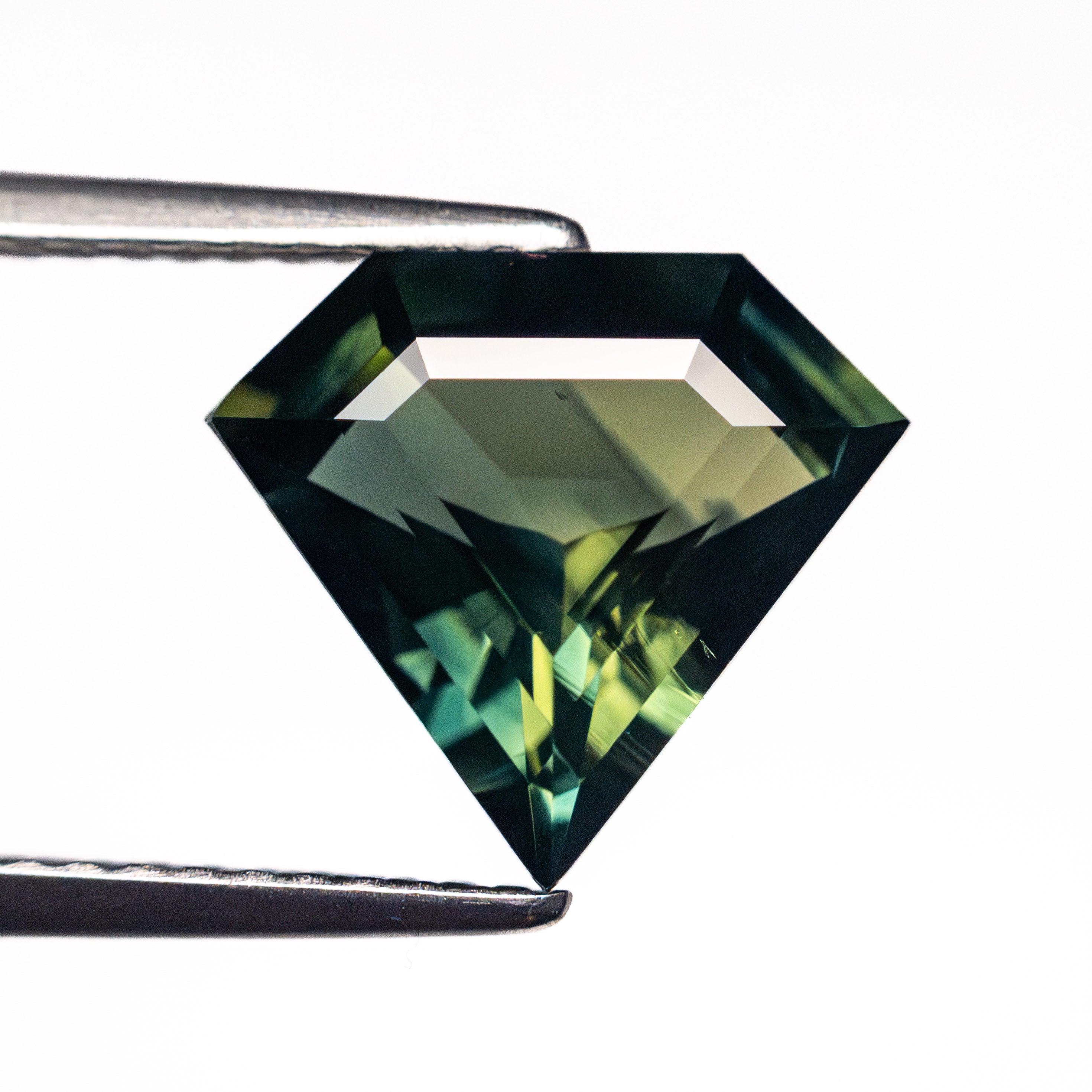 2.84ct 9.76x10.81x4.72mm Shield Step Cut Sapphire 26727-01-Staghead Designs