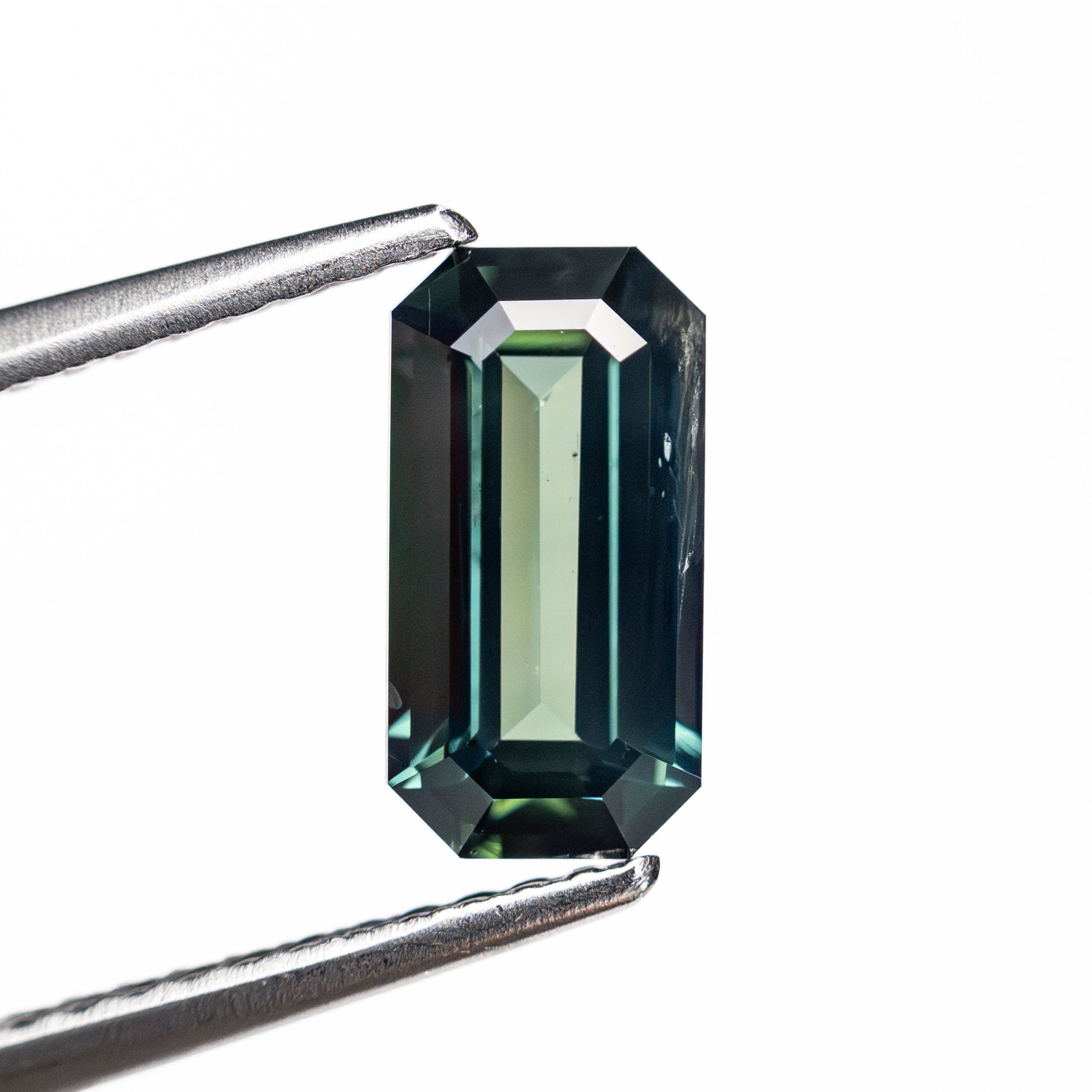 1.56ct 9.24x4.71x3.35mm Cut Corner Rectangle Step Cut Sapphire 27155-01-Staghead Designs