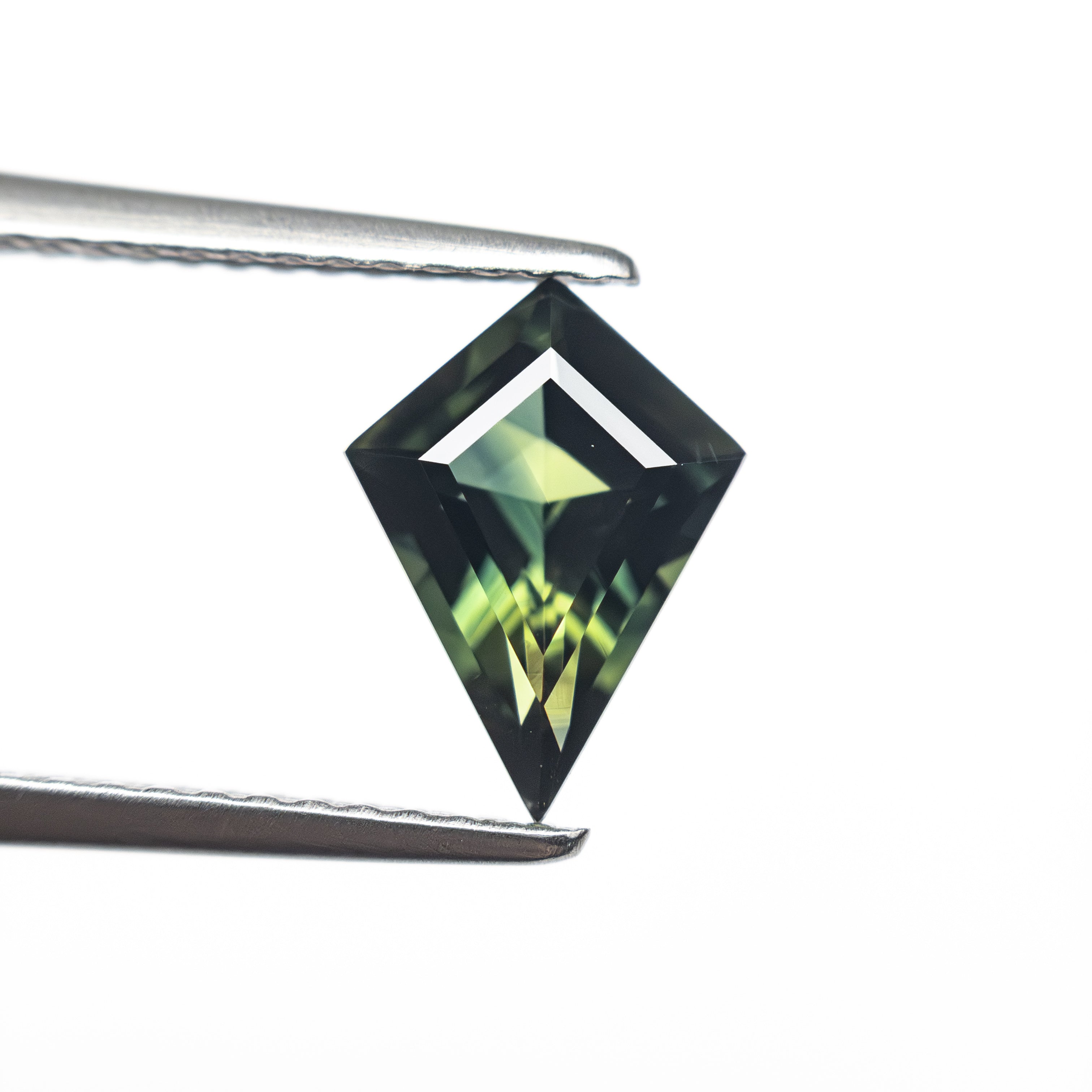1.24ct 9.52x6.20x3.61mm Kite Step Cut Sapphire 27326-02-Staghead Designs