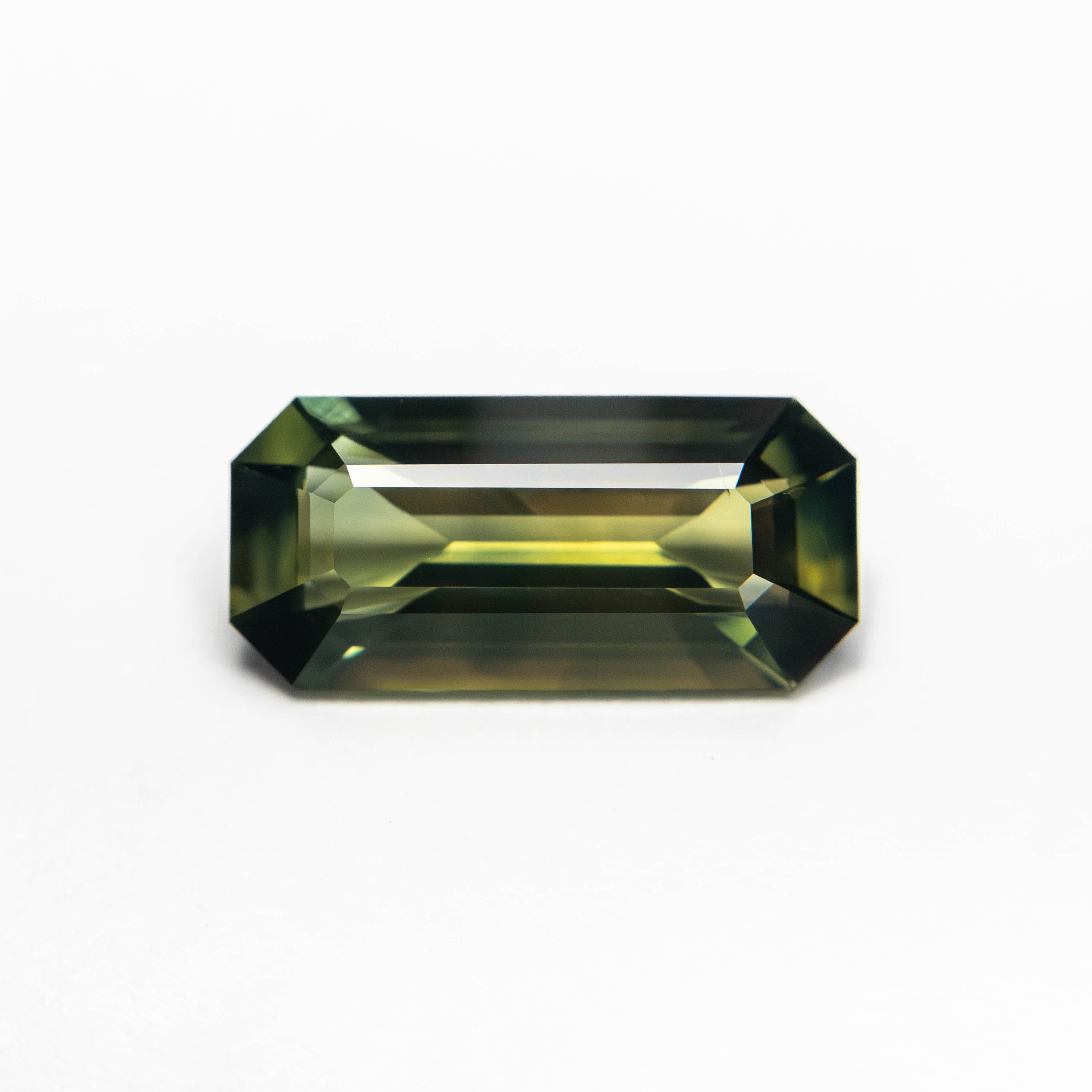 1.10ct 9.42x4.42x2.71mm Cut Corner Rectangle Step Cut Sapphire 27329-01-Staghead Designs
