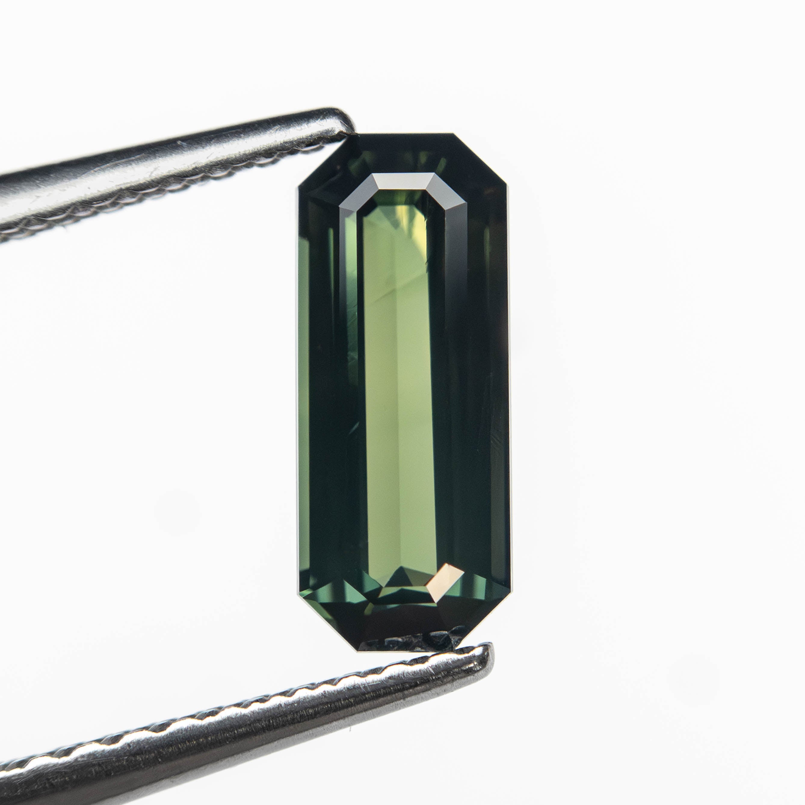 1.09ct 9.35x3.86x2.69mm Cut Corner Rectangle Step Cut Sapphire 27329-02-Staghead Designs