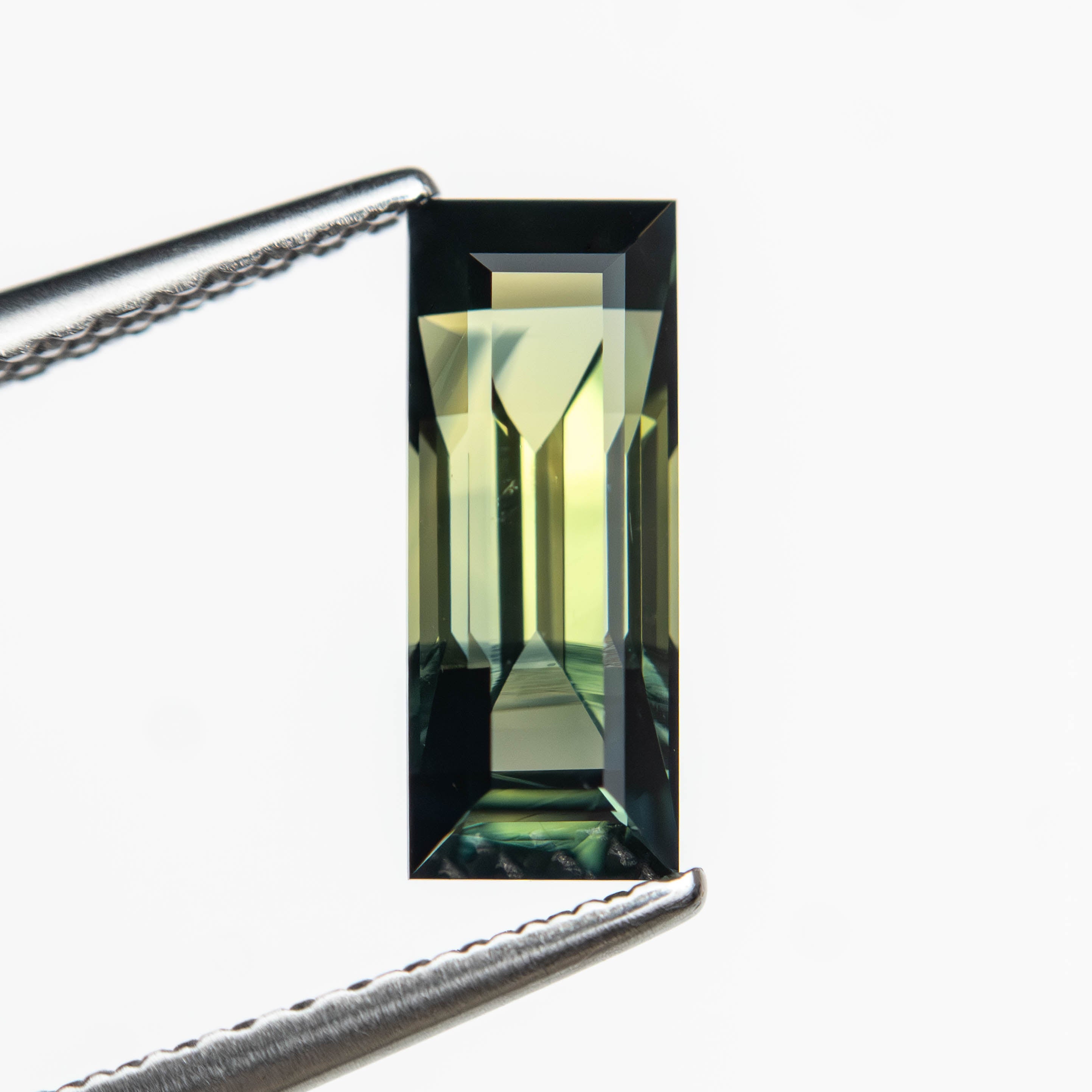 1.42ct 9.72x3.88x3.62mm Rectangle Step Cut Sapphire 27330-01-Staghead Designs