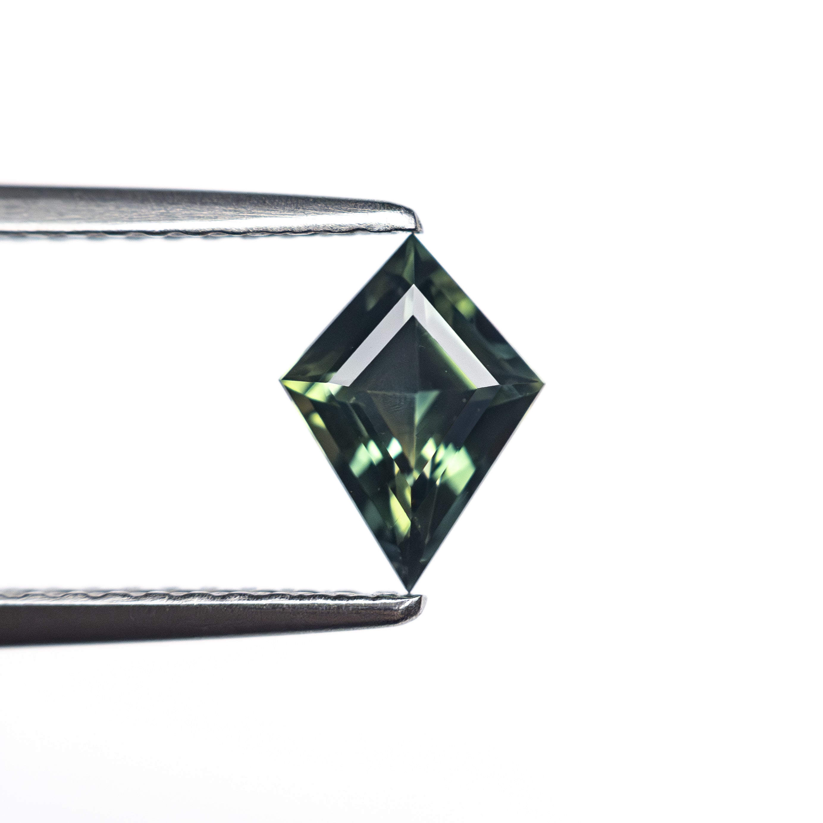 0.66ct 7.66x4.86x3.08mm Kite Step Cut Sapphire 27336-24-Staghead Designs