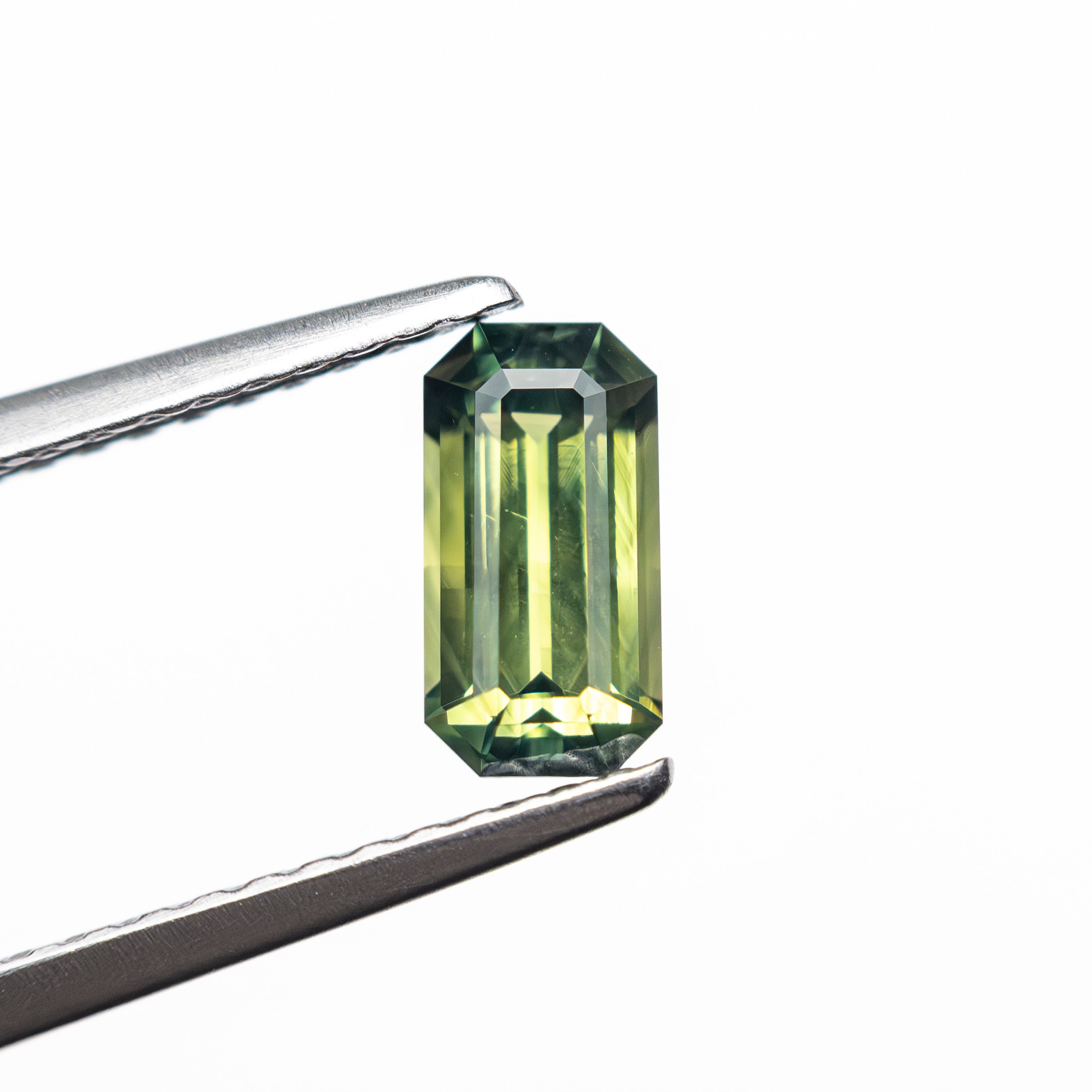 0.82ct 7.20x3.73x2.98mm Cut Corner Rectangle Step Cut Sapphire 27336-49-Staghead Designs